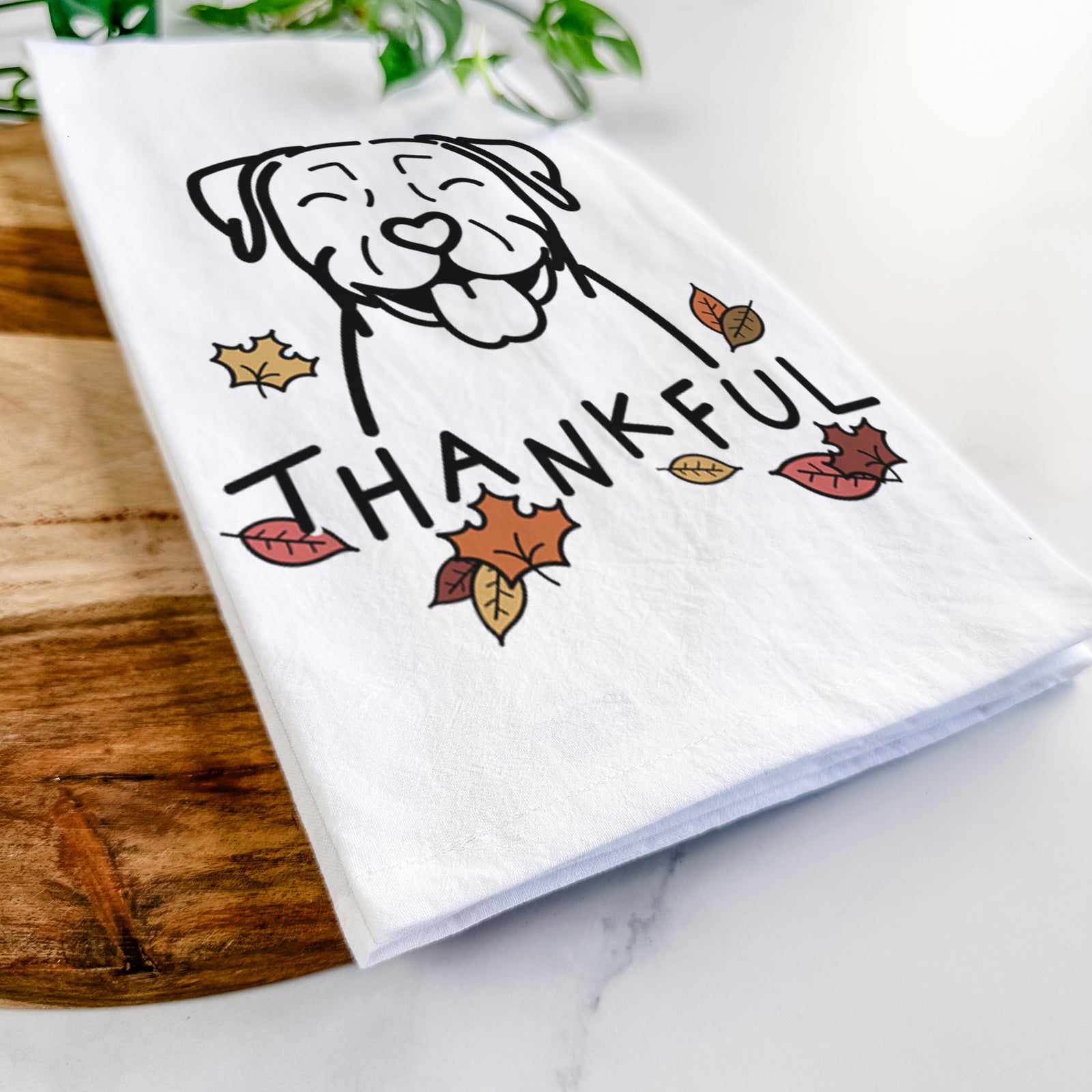 Minimalist line drawing of a Pitbull with 'Thankful' lettering on a tea towel