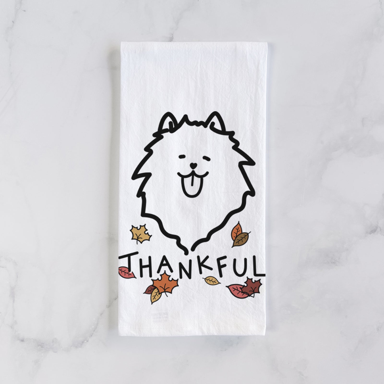 Minimalist line drawing of a Pomeranian with 'Thankful' lettering on a tea towel