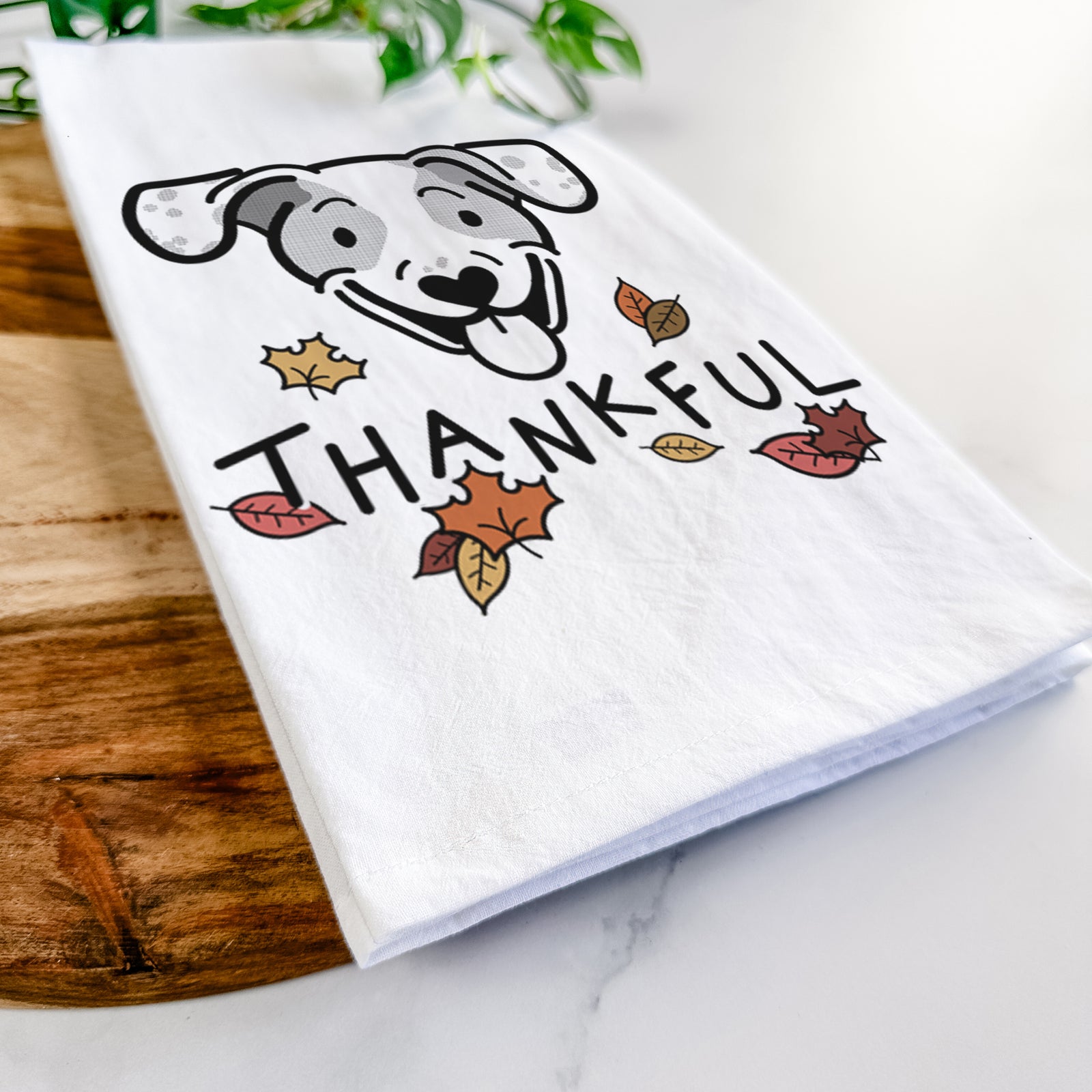 Minimalist line drawing of Roland the Beagle Mix with 'Thankful' lettering on a tea towel
