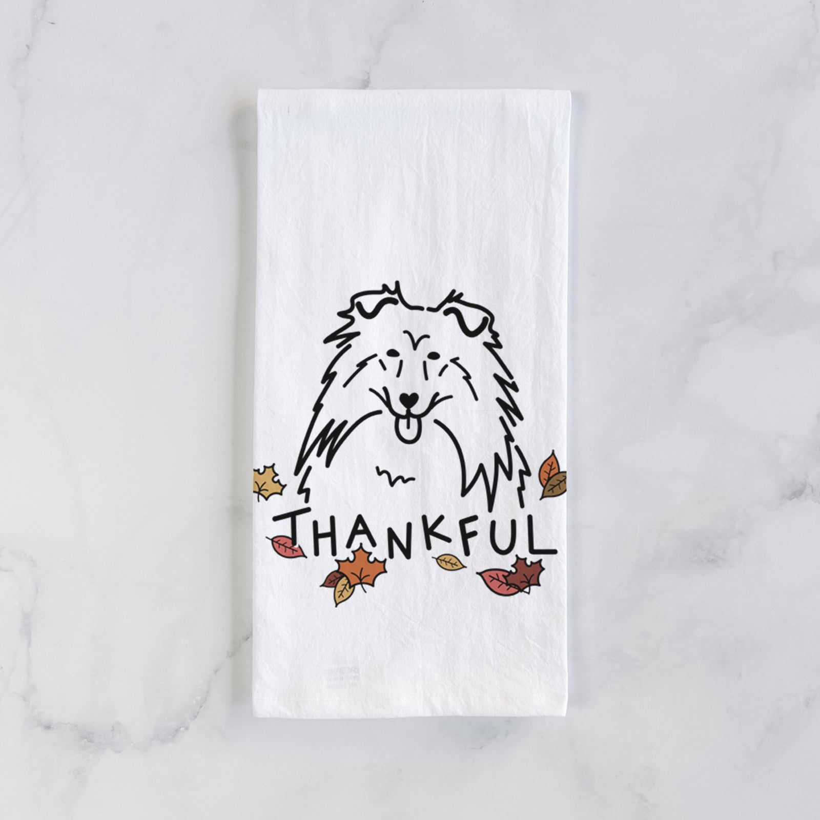Minimalist line drawing of a Rough Collie with 'Thankful' lettering on a tea towel