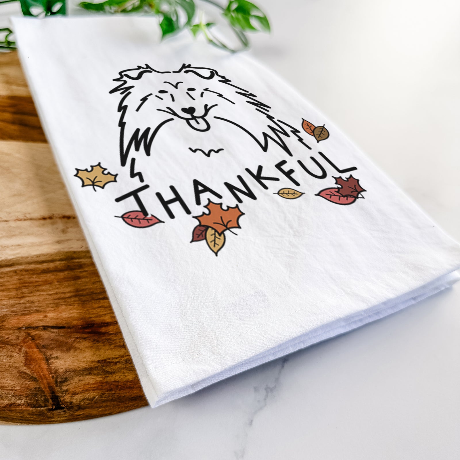 Minimalist line drawing of a Rough Collie with 'Thankful' lettering on a tea towel
