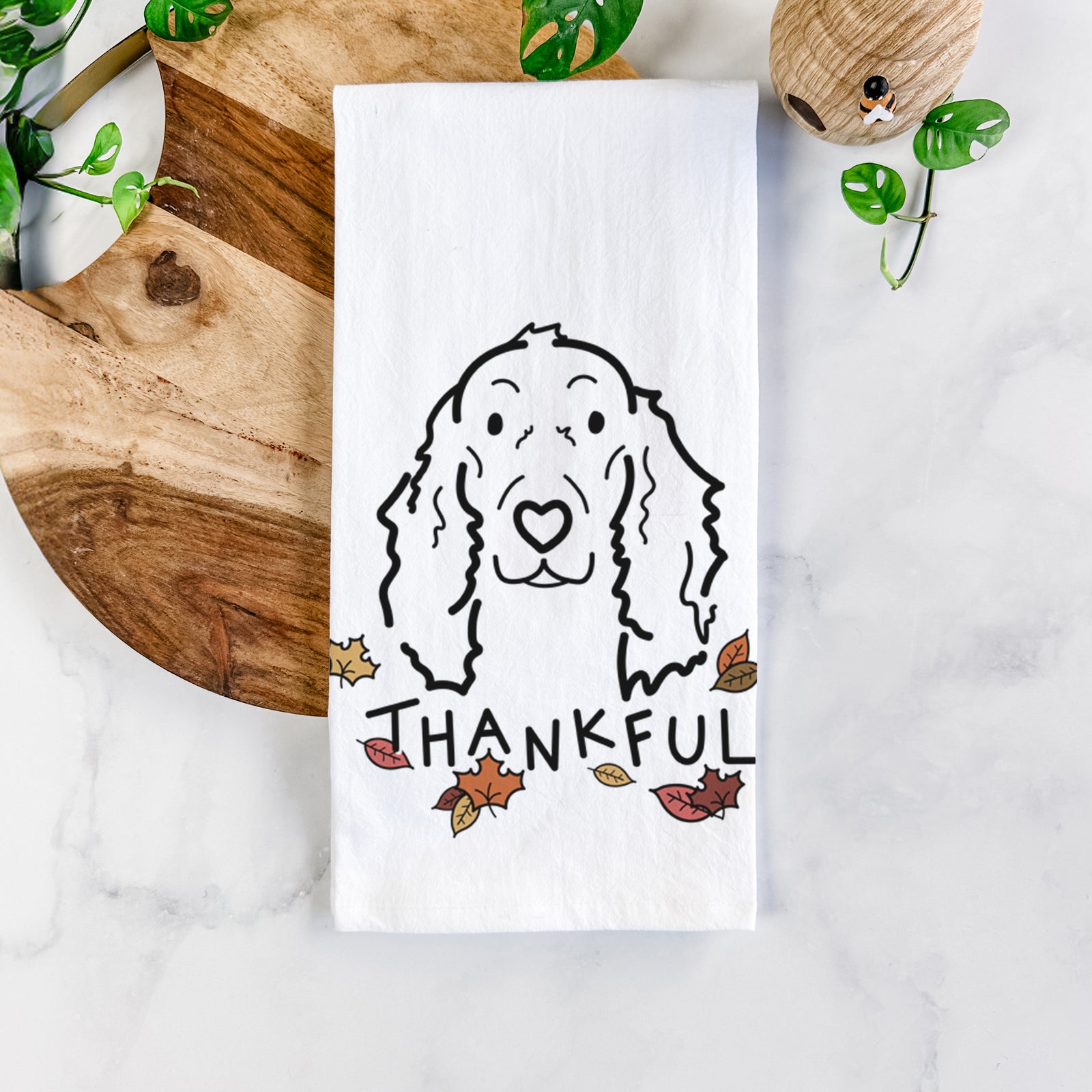 Minimalist line drawing of Seven the Irish Setter with 'Thankful' lettering on a tea towel