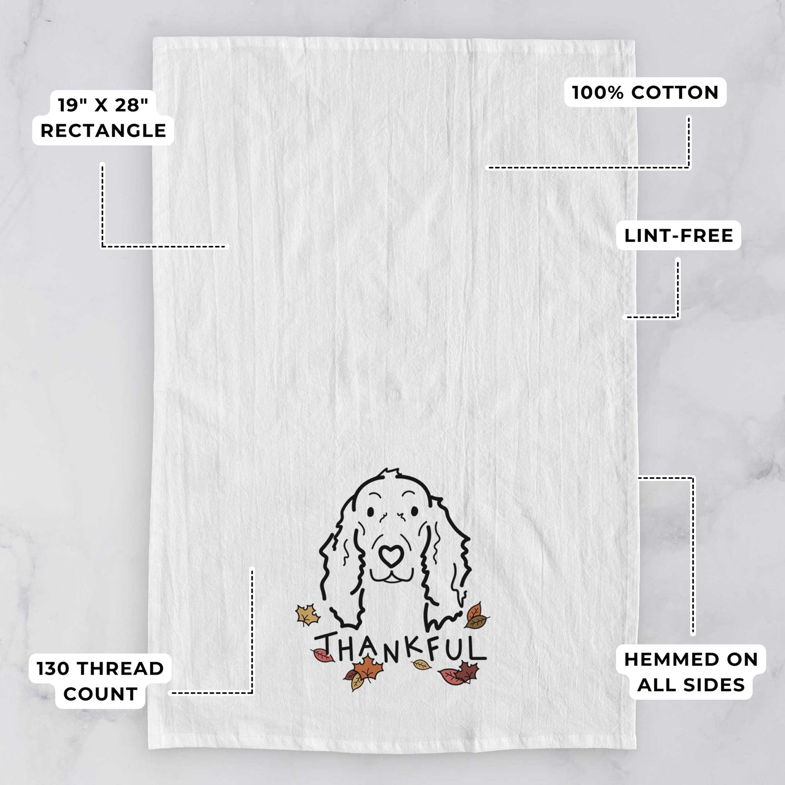 Minimalist line drawing of Seven the Irish Setter with 'Thankful' lettering on a tea towel, with feature callouts: 19 x 28 inch rectangle, 100% cotton, lint-free, 120 thread count, hemmed on all sides