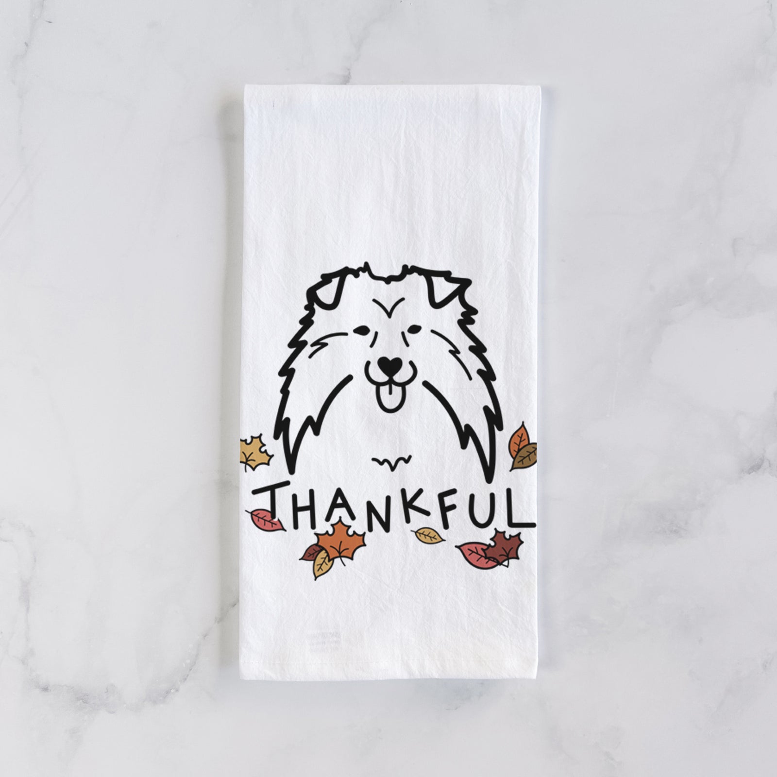 Minimalist line drawing of a Shetland Sheepdog with 'Thankful' lettering on a tea towel