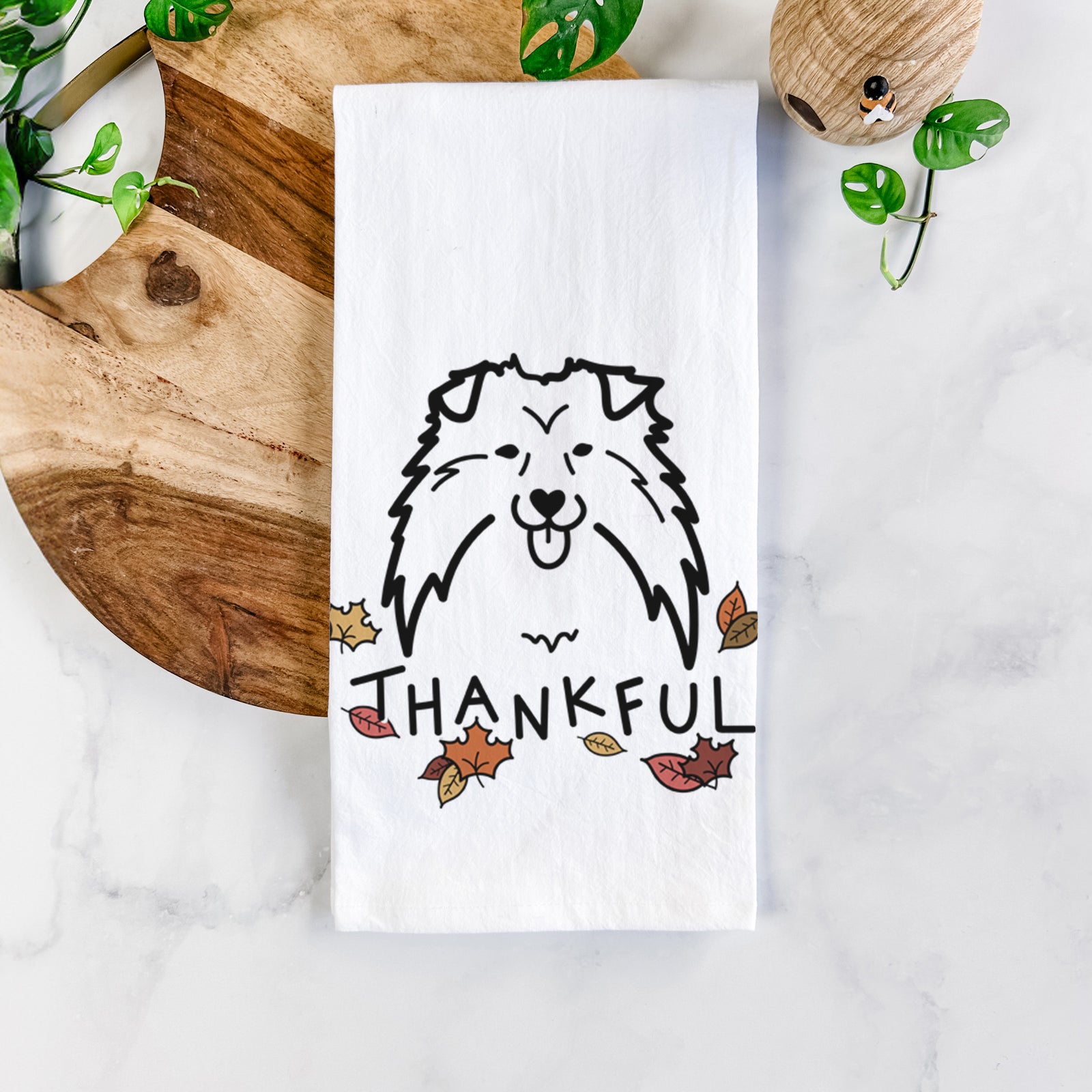 Minimalist line drawing of a Shetland Sheepdog with 'Thankful' lettering on a tea towel