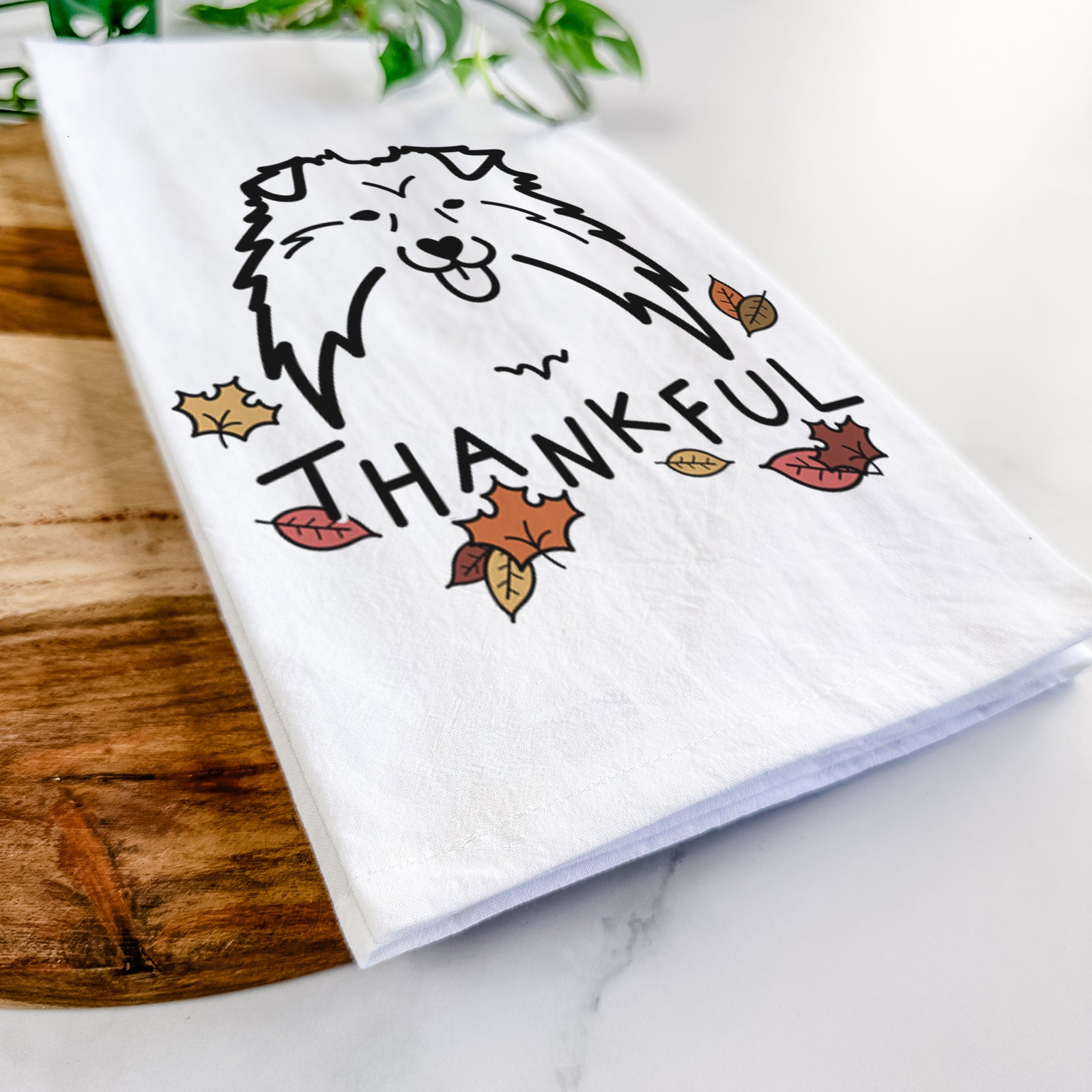 Minimalist line drawing of a Shetland Sheepdog with 'Thankful' lettering on a tea towel