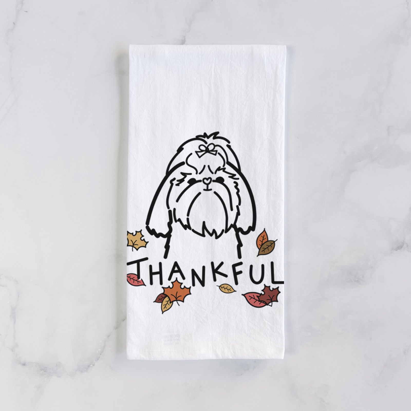 Minimalist line drawing of a Shih Tzu with 'Thankful' lettering on a tea towel