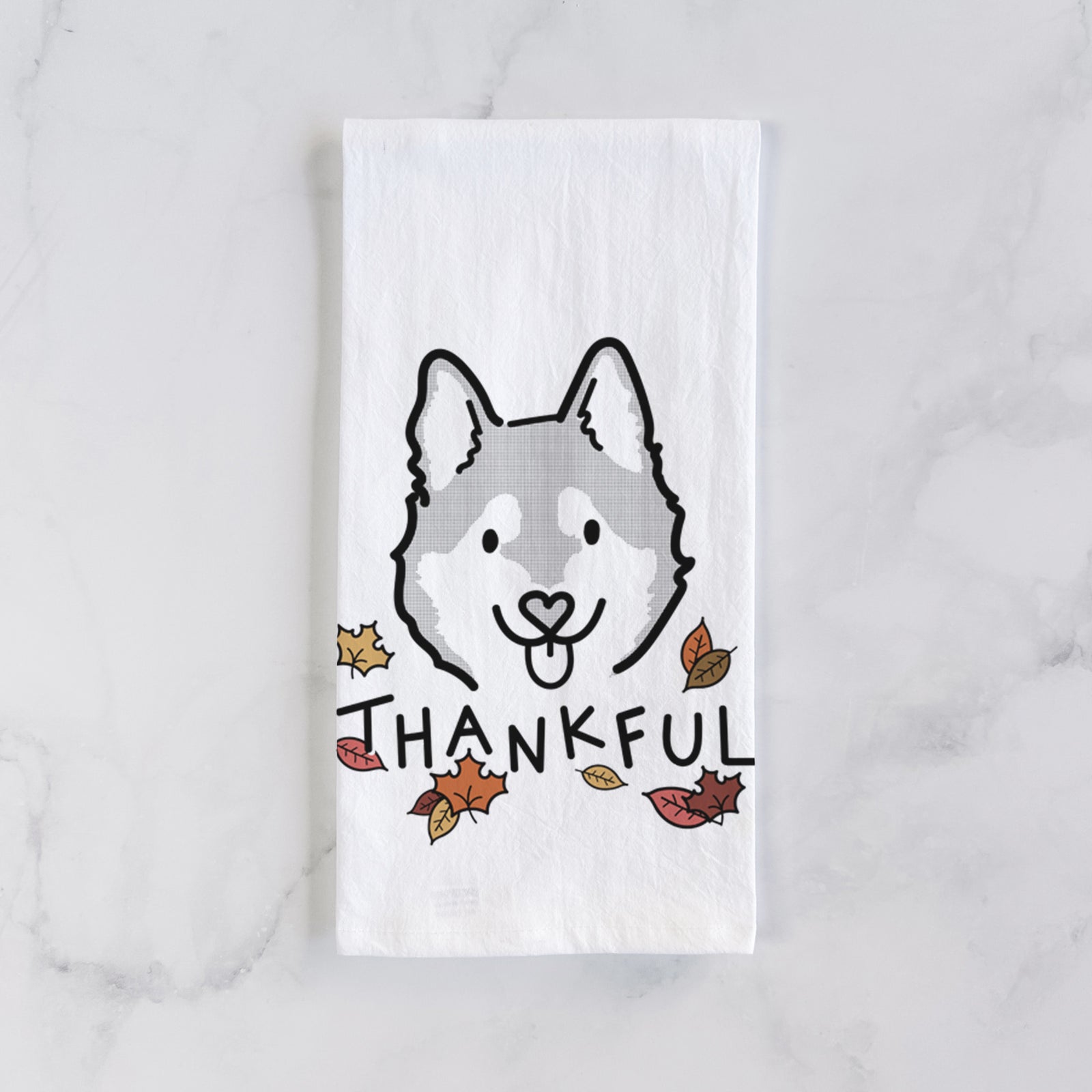 Minimalist line drawing of Sitka the Alaskan Klee Kai with 'Thankful' lettering on a tea towel