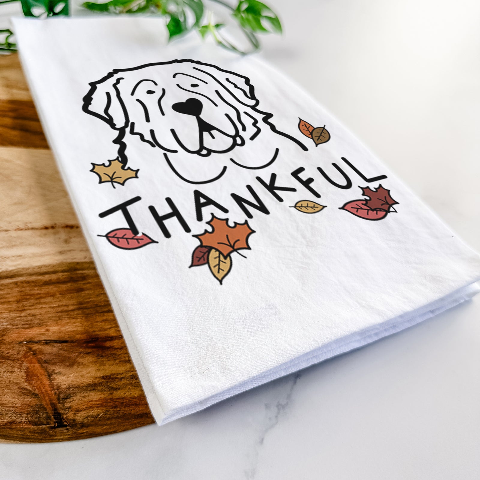 Minimalist line drawing of a Saint Bernard with 'Thankful' lettering on a tea towel