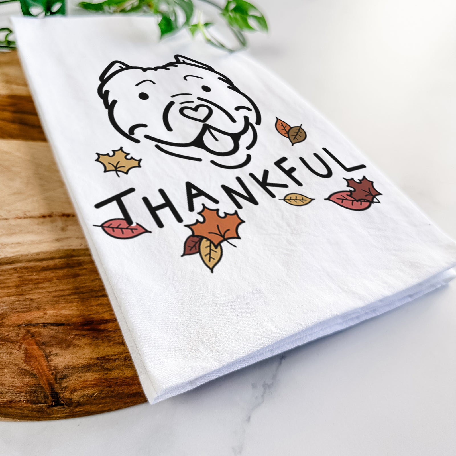 Minimalist line drawing of Tank the American Bully with 'Thankful' lettering on a tea towel