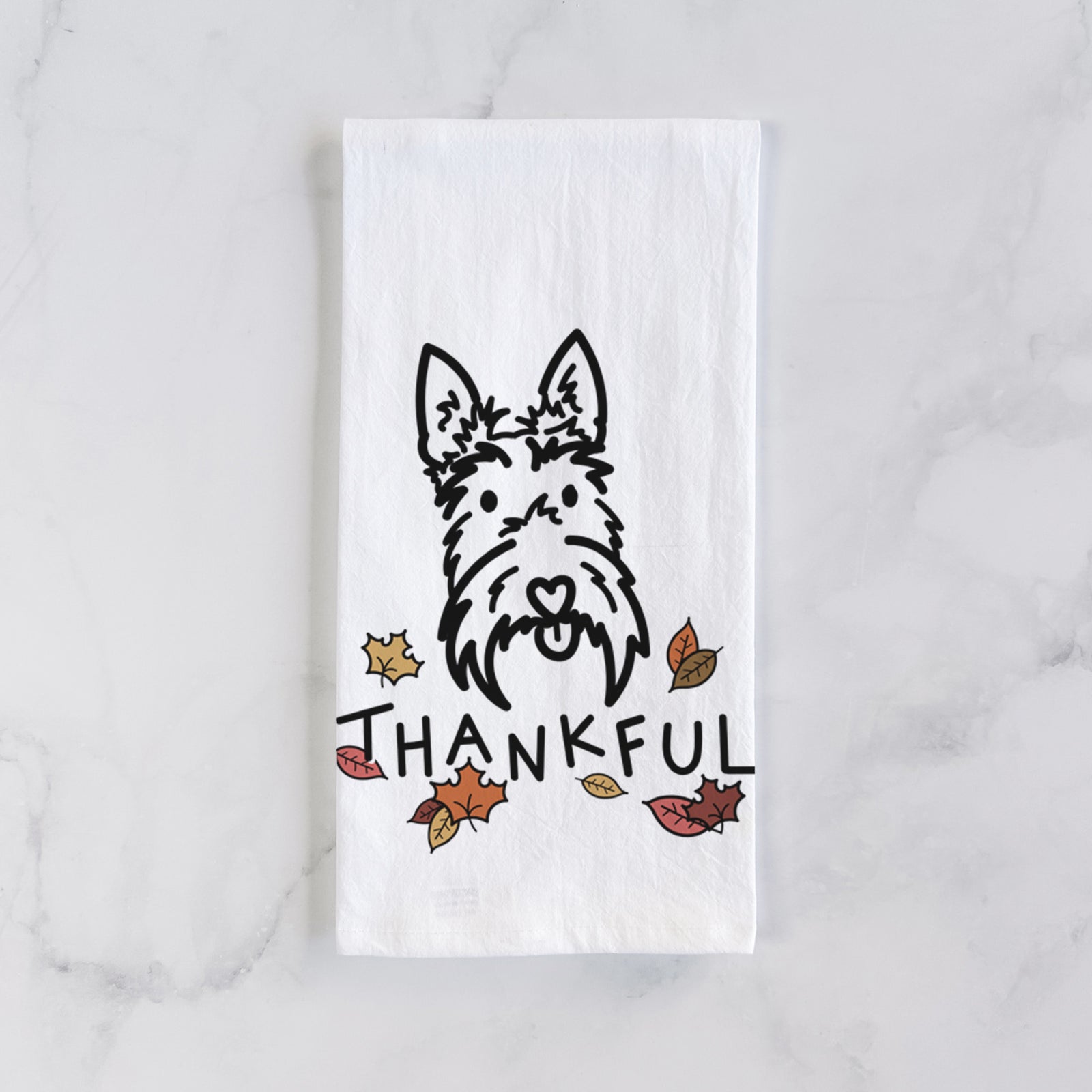 Minimalist line drawing of Thistle the Scottish Terrier with 'Thankful' lettering on a tea towel