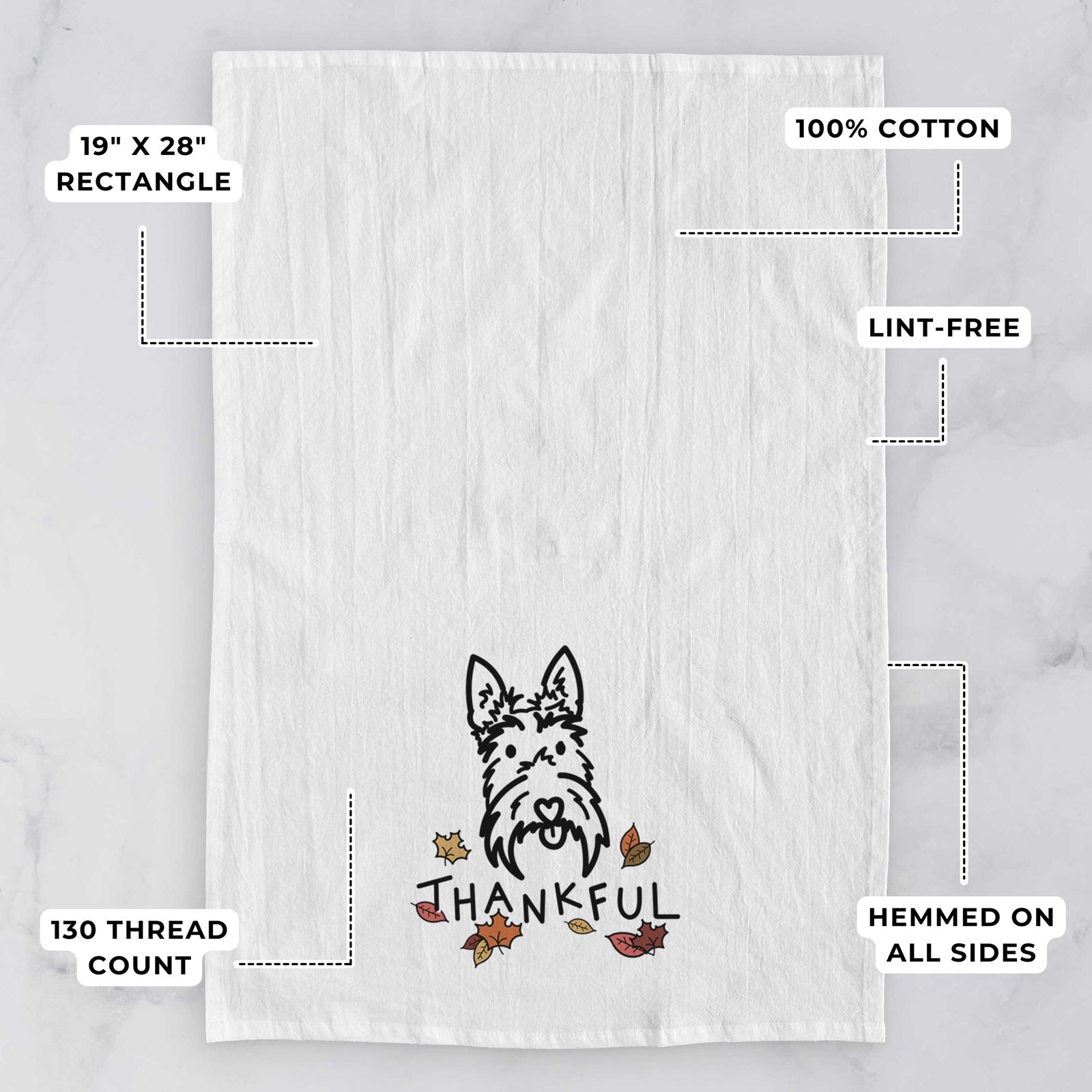 Minimalist line drawing of Thistle the Scottish Terrier with 'Thankful' lettering on a tea towel, with feature callouts: 19 x 28 inch rectangle, 100% cotton, lint-free, 120 thread count, hemmed on all sides