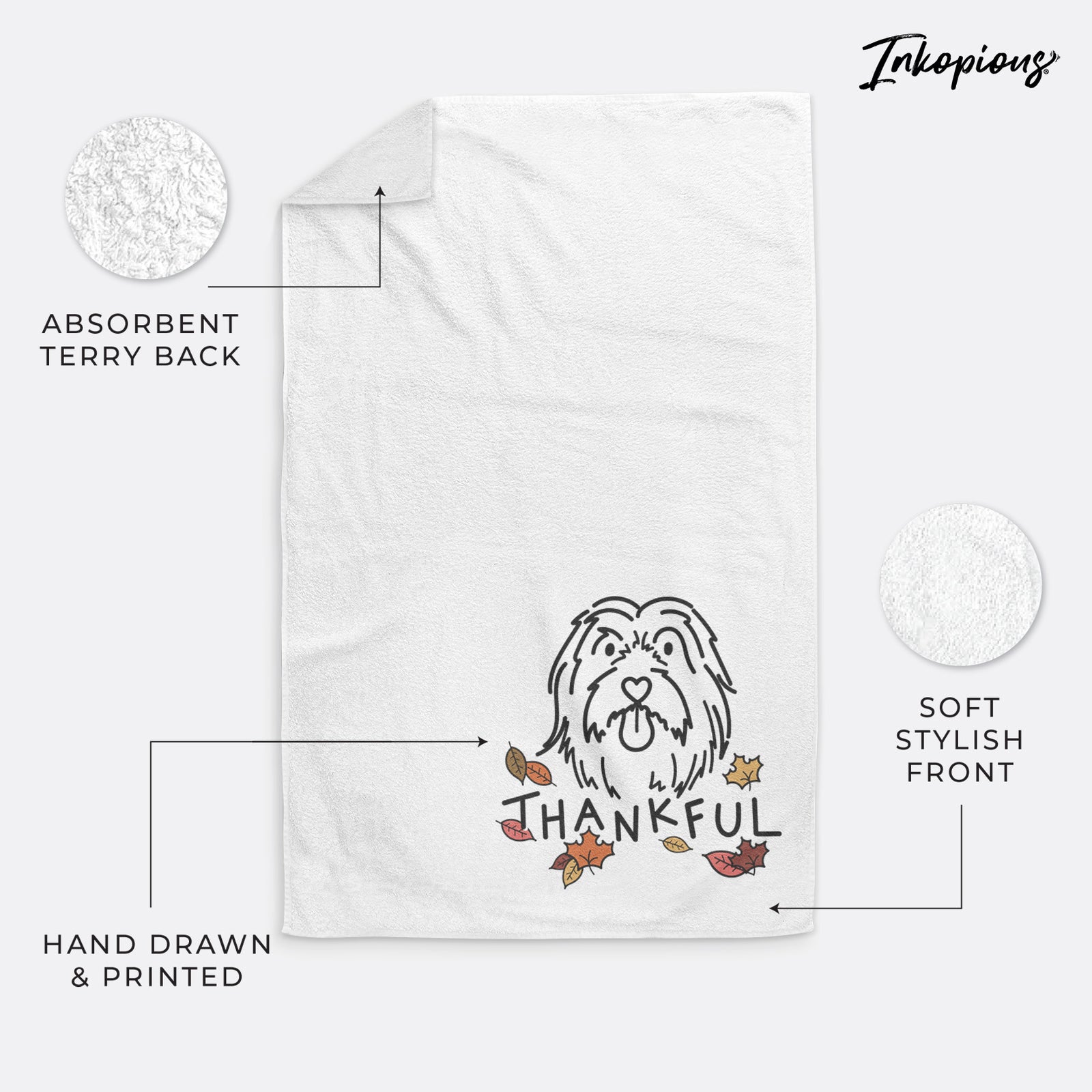 Minimalist line drawing of Tucker the Bearded Collie with 'Thankful' lettering on a decorative hand towel