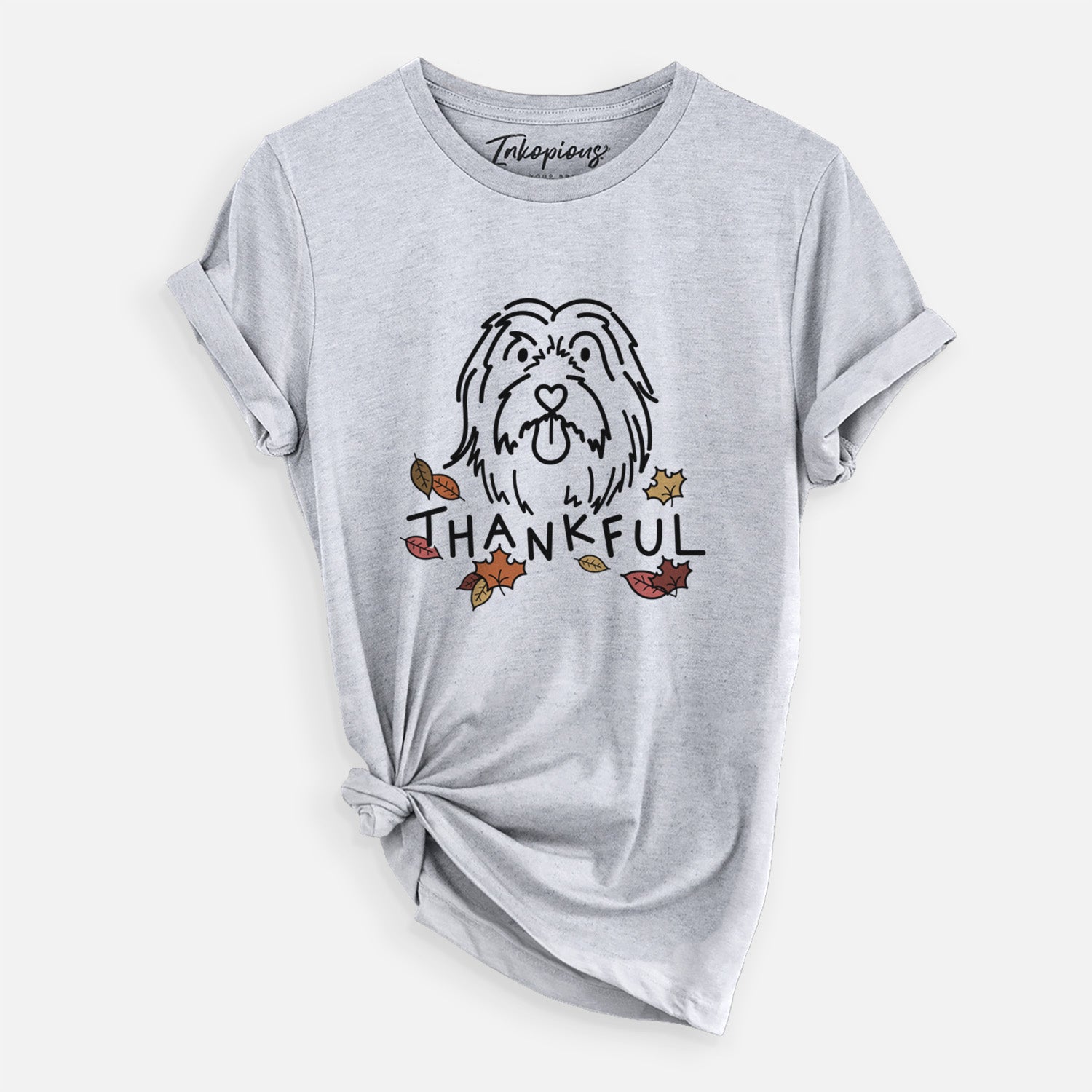 Minimalist line drawing of Tucker the Bearded Collie with 'Thankful' lettering on a Grey Unisex crewneck