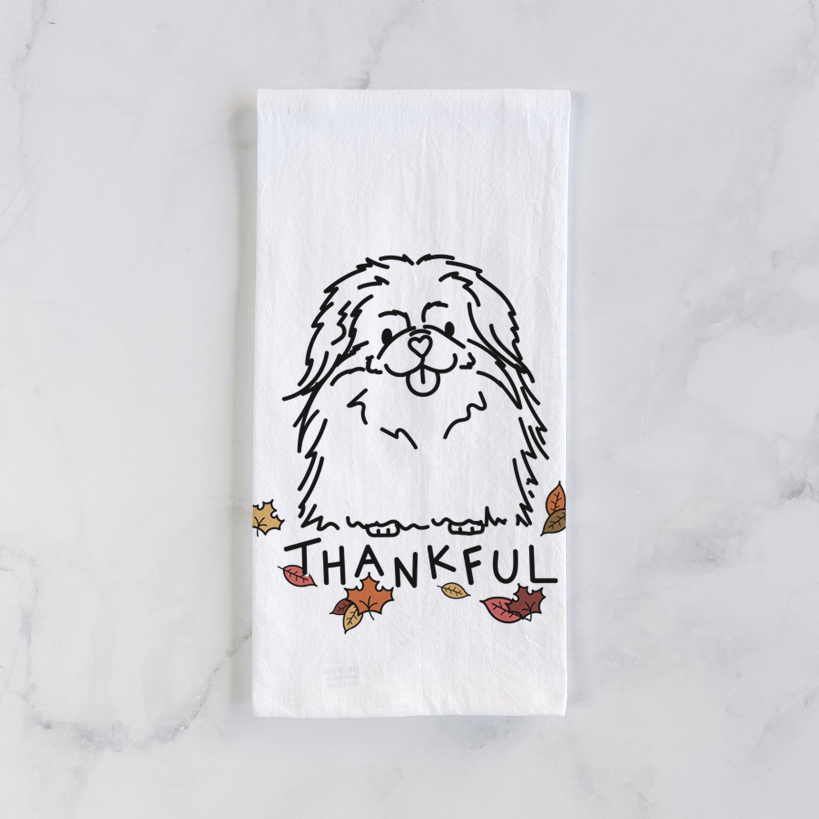 Minimalist line drawing of Viv the Pekingese with 'Thankful' lettering on a tea towel