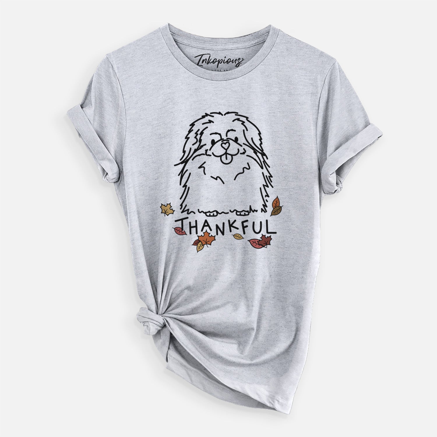 Minimalist line drawing of Viv the Pekingese with 'Thankful' lettering on a Grey Unisex crewneck
