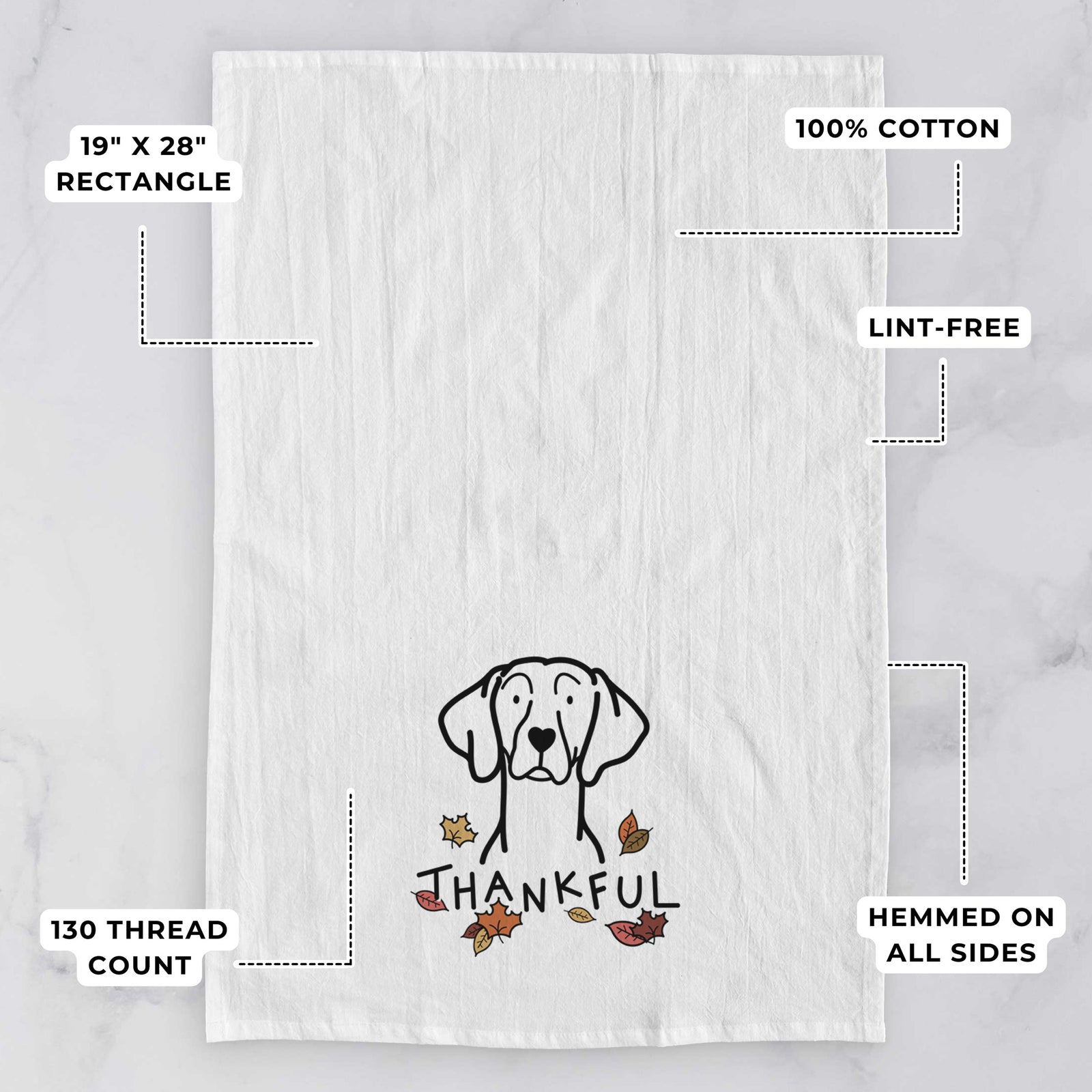Minimalist line drawing of a Weimaraner with 'Thankful' lettering on a tea towel, with feature callouts: 19 x 28 inch rectangle, 100% cotton, lint-free, 120 thread count, hemmed on all sides
