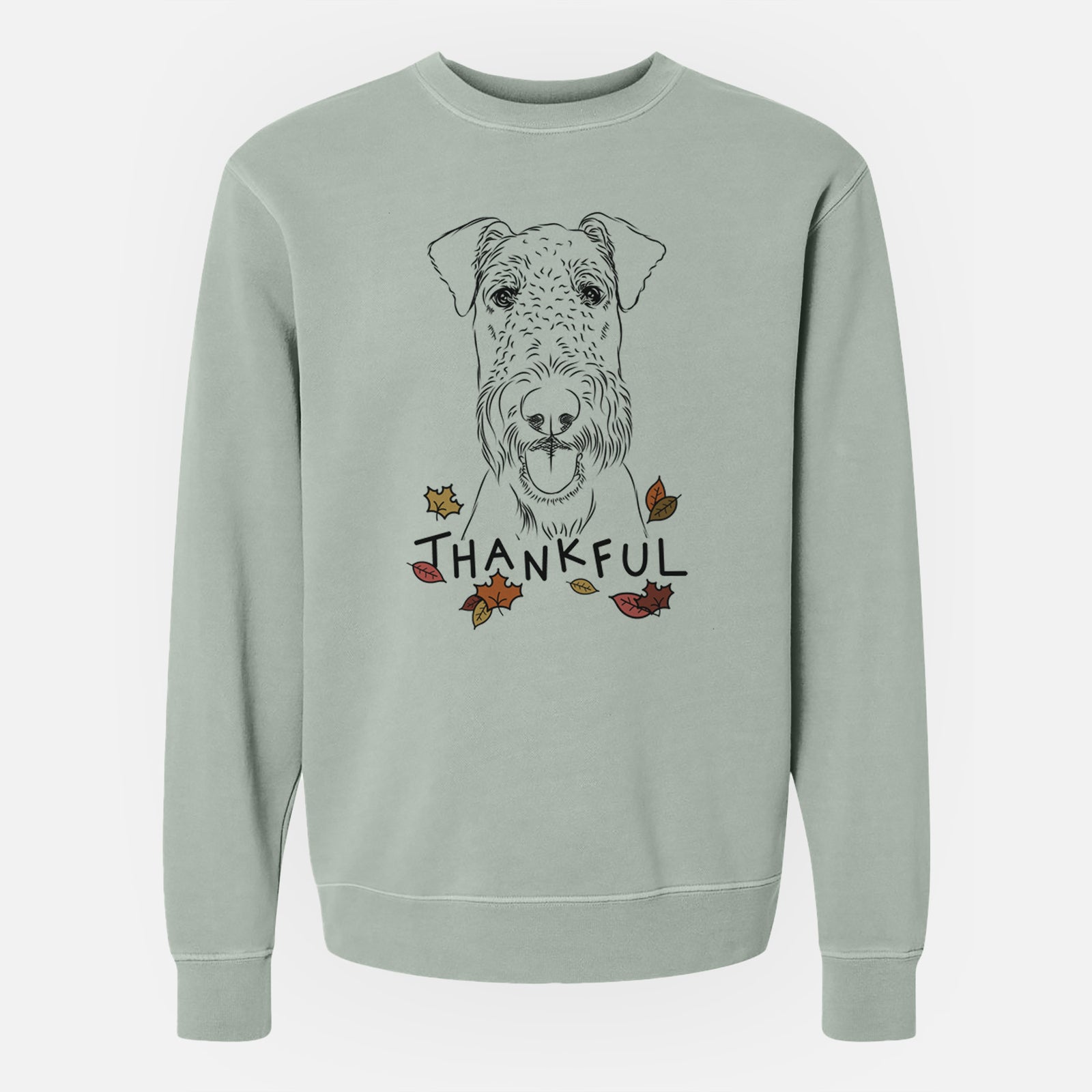 Hand-drawn sketch of Andy the Airedale Terrier with 'Thankful' lettering and autumn leaves on a Sage Unisex pigment dyed crew sweatshirt
