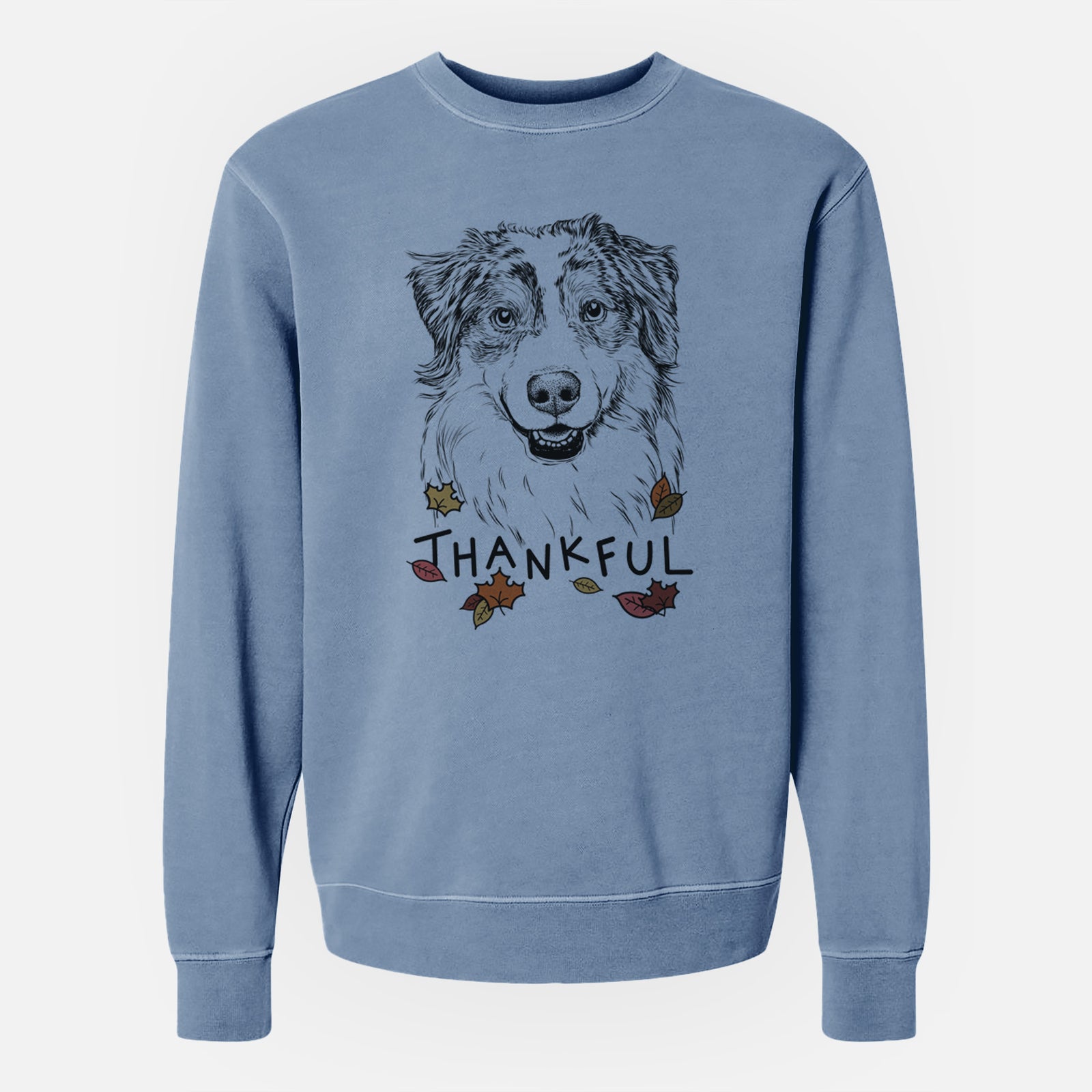 Hand-drawn sketch of Aonghus the Australian Shepherd with 'Thankful' lettering and autumn leaves on a Slate Blue Unisex pigment dyed crew sweatshirt