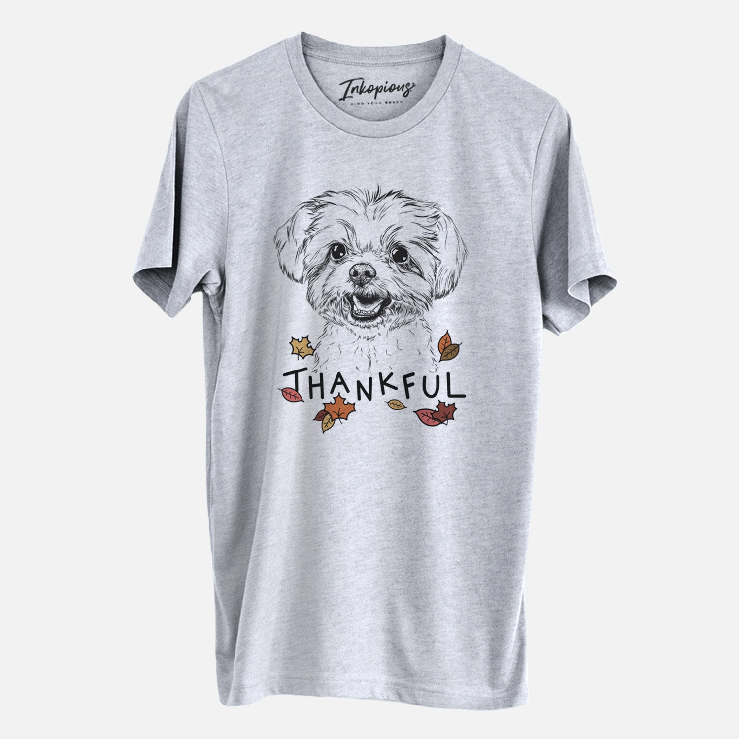 Hand-drawn sketch of Aspen the Morkie with 'Thankful' lettering and autumn leaves on a Grey Unisex crewneck