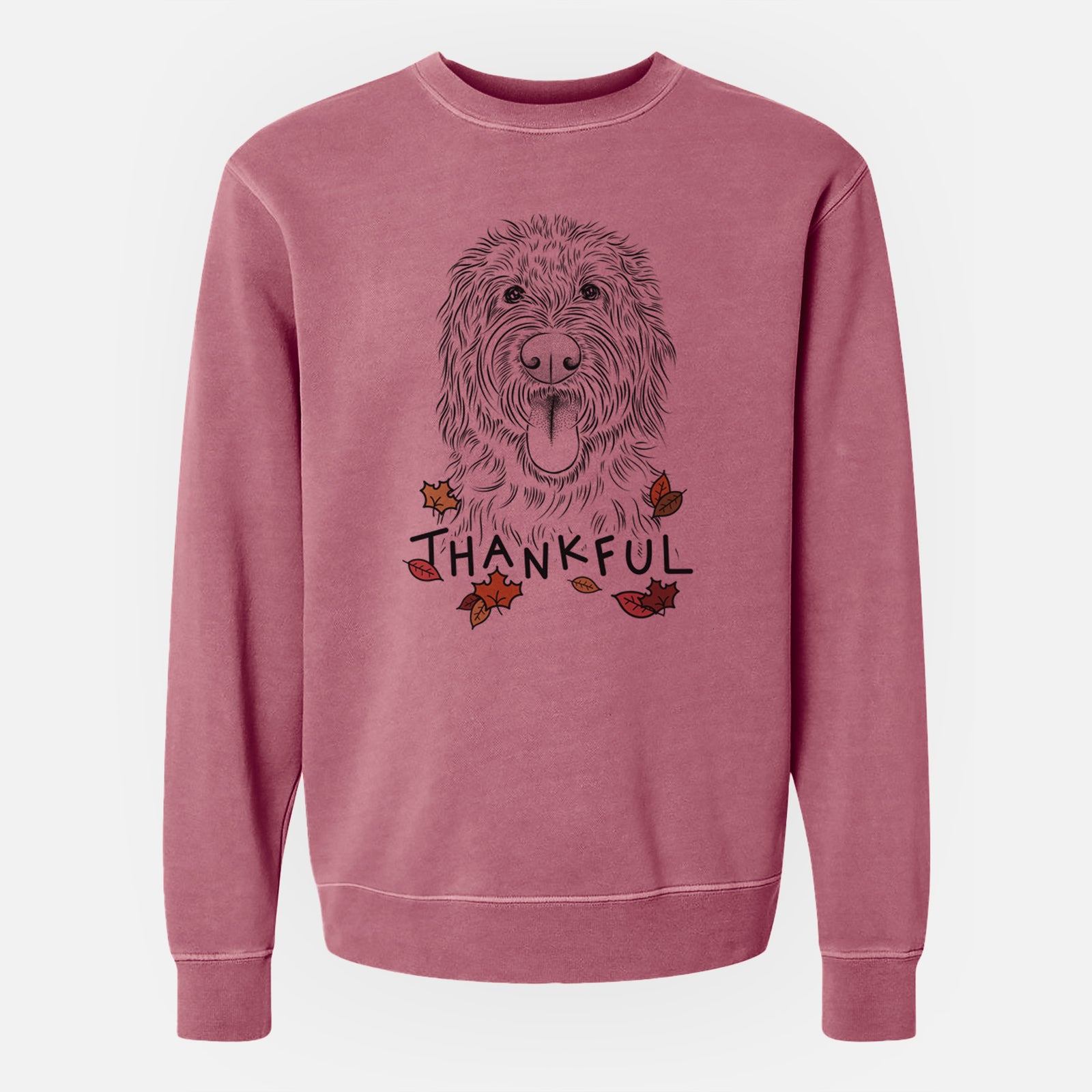 Hand-drawn sketch of Bennett the Doodle with 'Thankful' lettering and autumn leaves on a Maroon Unisex pigment dyed crew sweatshirt