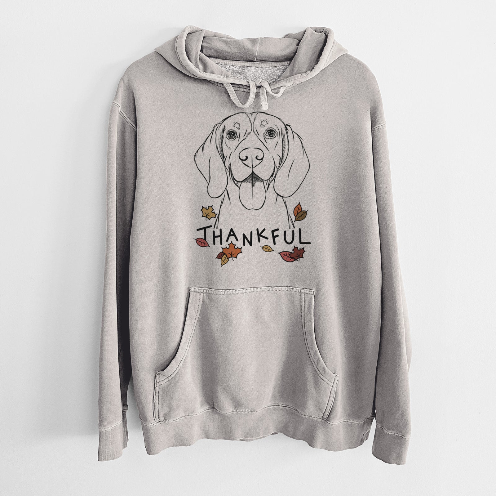 Hand-drawn sketch of Bogie the Beagle with 'Thankful' lettering and autumn leaves on a Cement Unisex pigment dyed hoodie
