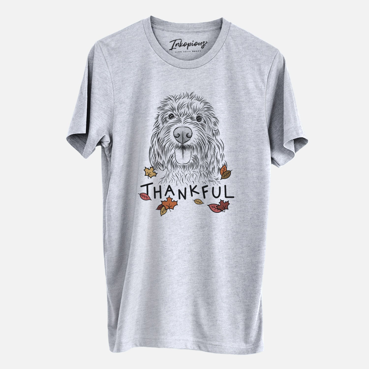 Hand-drawn sketch of Clover the Cockapoo with 'Thankful' lettering and autumn leaves on a Grey Unisex crewneck