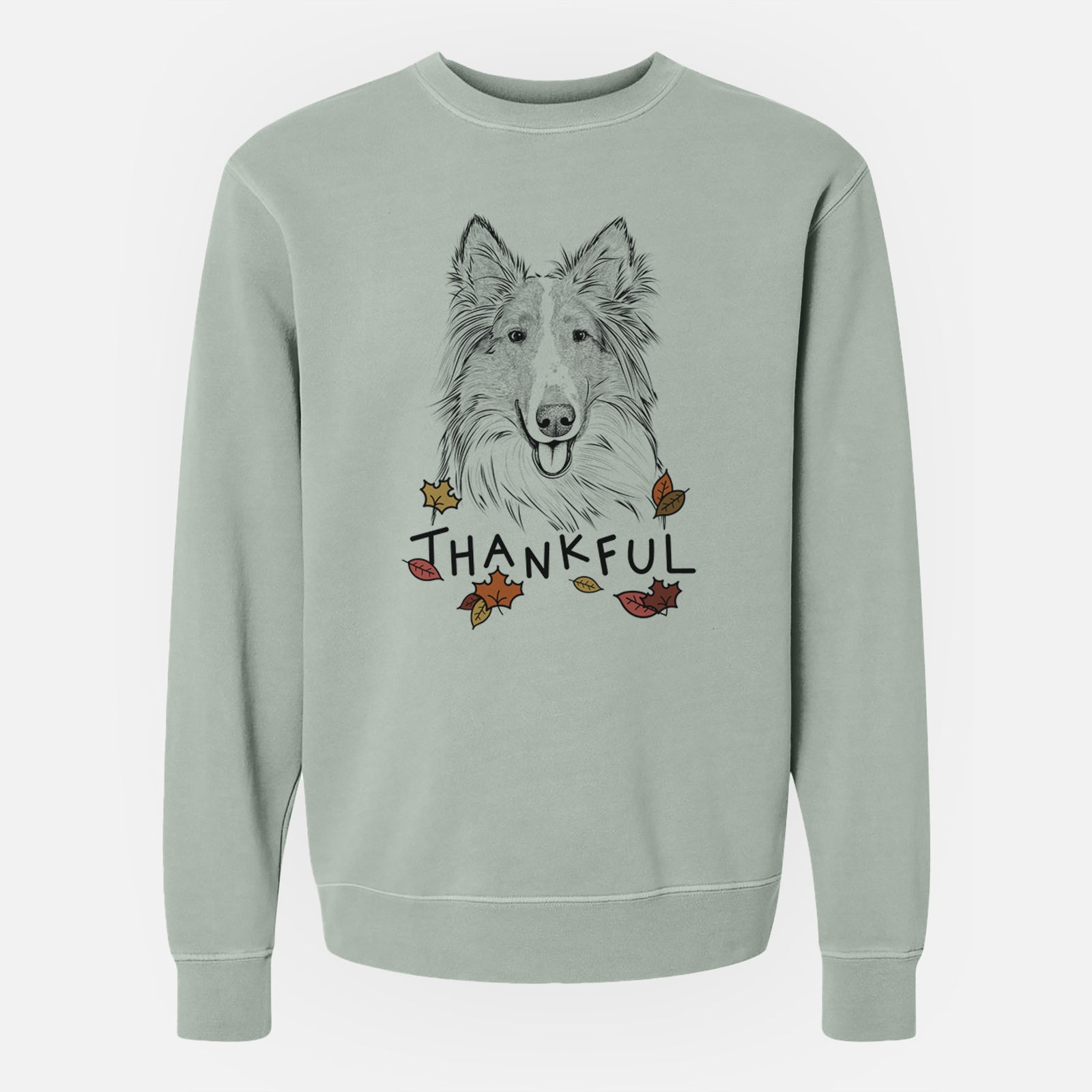 Hand-drawn sketch of Conrad the Rough Collie with 'Thankful' lettering and autumn leaves on a Sage Unisex pigment dyed crew sweatshirt
