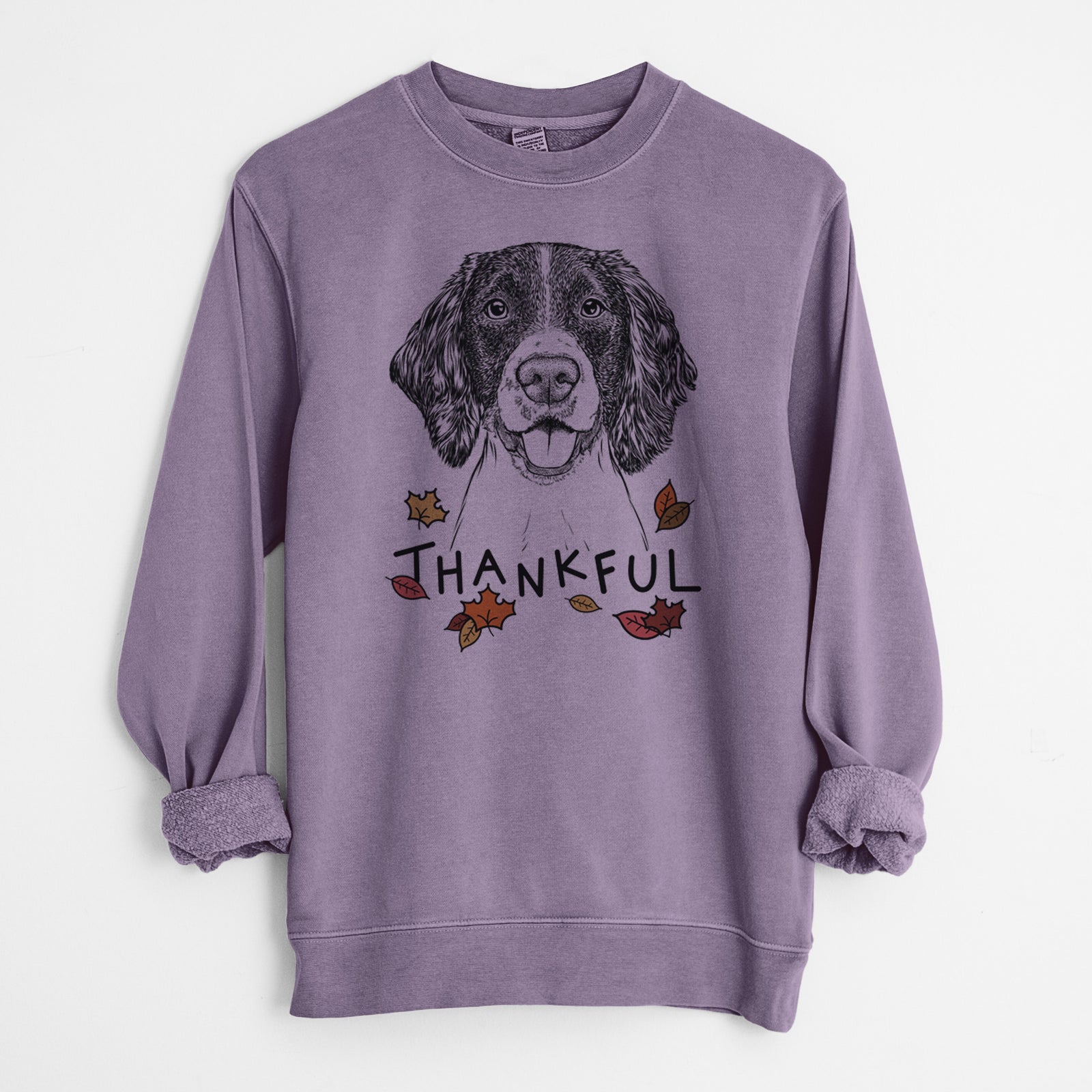 Hand-drawn sketch of Ever the English Springer Spaniel with 'Thankful' lettering and autumn leaves on a Plum Unisex pigment dyed crew sweatshirt