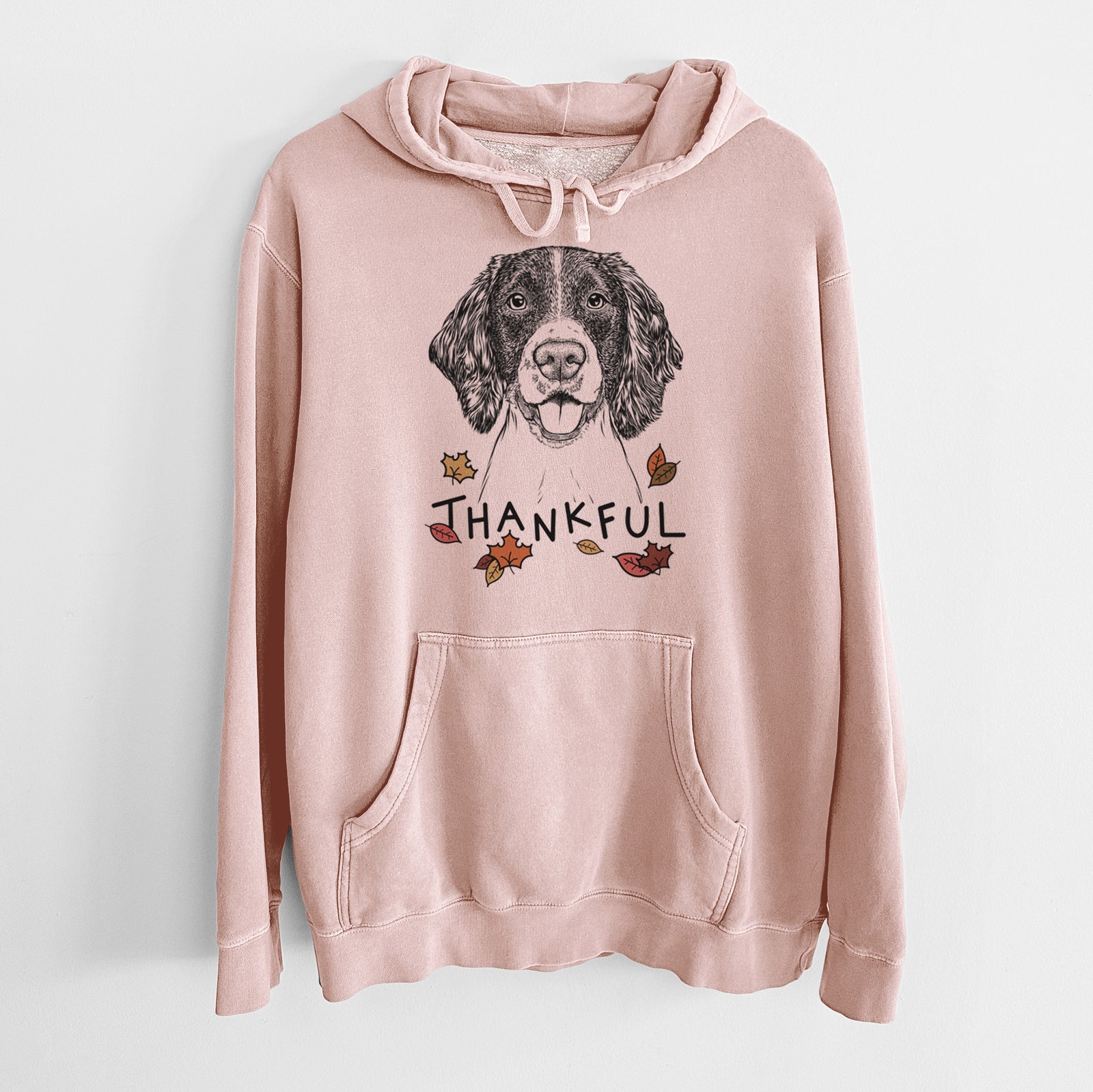 Hand-drawn sketch of Ever the English Springer Spaniel with 'Thankful' lettering and autumn leaves on a Dusty Pink Unisex pigment dyed hoodie
