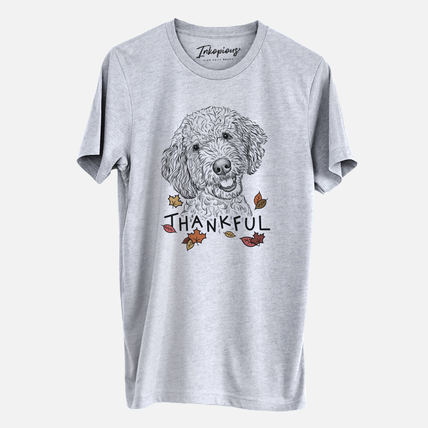 Hand-drawn sketch of Gizmo the Goldendoodle with 'Thankful' lettering and autumn leaves on a Grey Unisex crewneck