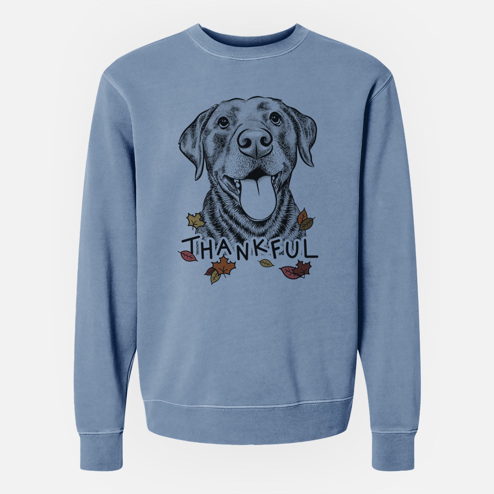 Hand-drawn sketch of Gwen the Labrador Retriever with 'Thankful' lettering and autumn leaves on a Slate Blue Unisex pigment dyed crew sweatshirt