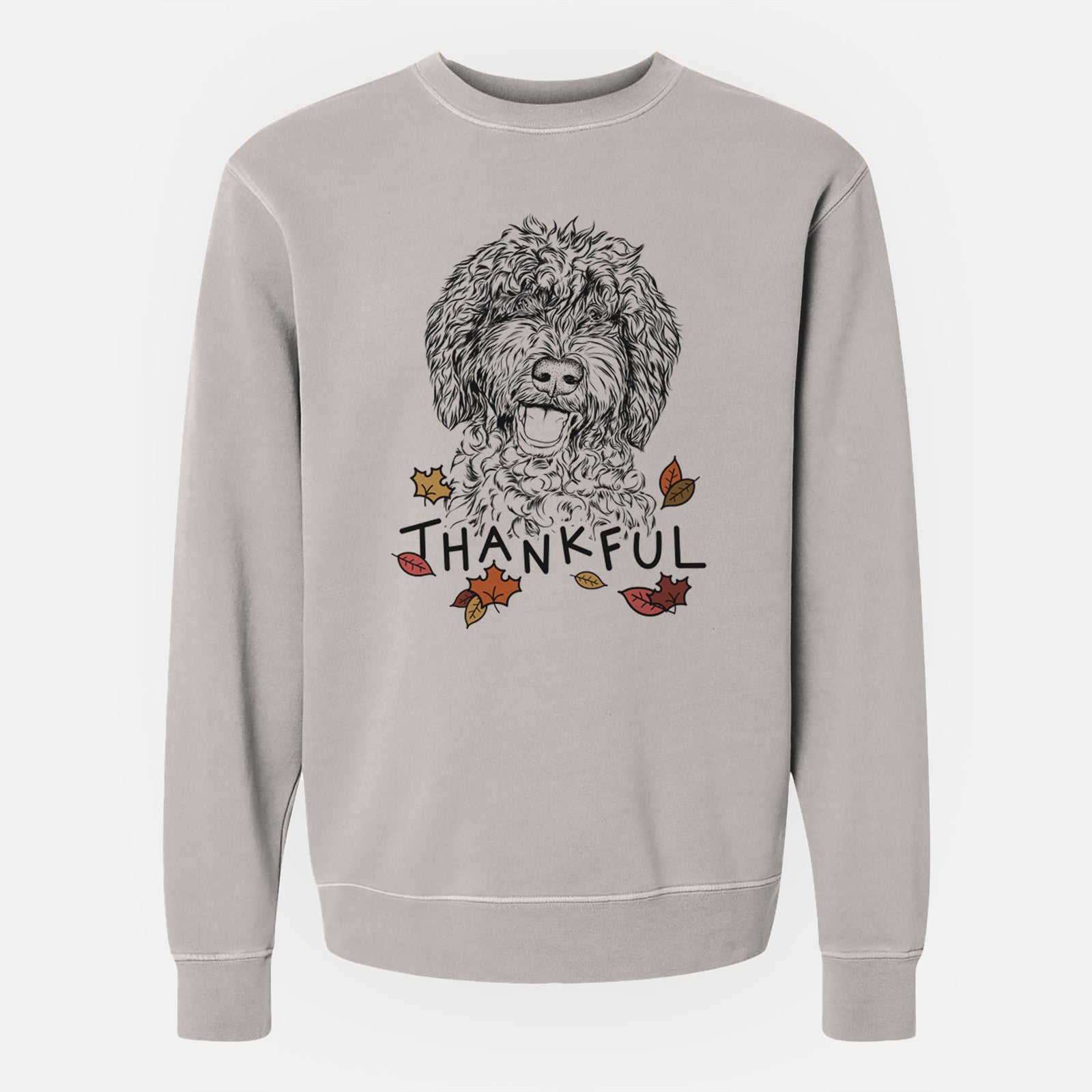 Hand-drawn sketch of Jack the Chocolate Labradoodle with 'Thankful' lettering and autumn leaves on a Cement Unisex pigment dyed crew sweatshirt