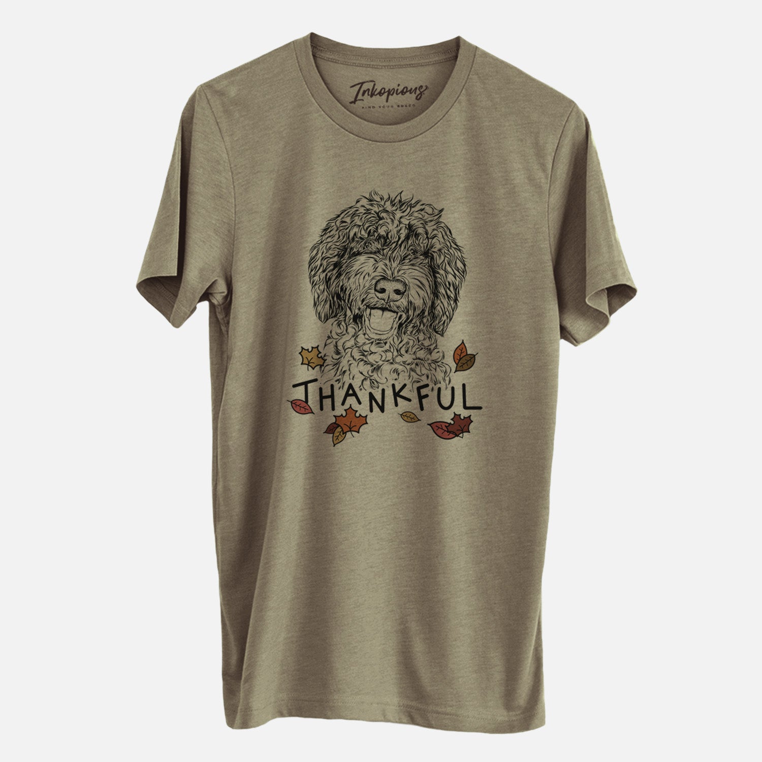 Hand-drawn sketch of Jack the Chocolate Labradoodle with 'Thankful' lettering and autumn leaves on an Olive Unisex crewneck