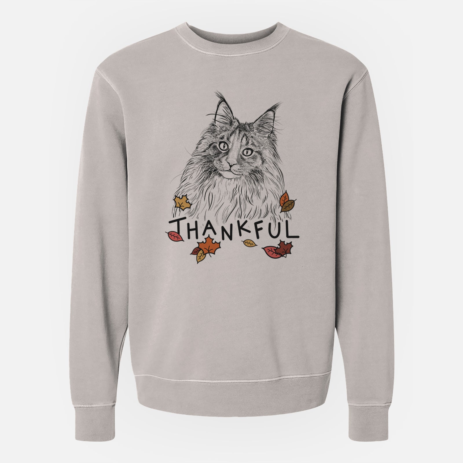 Hand-drawn sketch of Kiki the Maine Coon Cat with 'Thankful' lettering and autumn leaves on a Cement Unisex pigment dyed crew sweatshirt