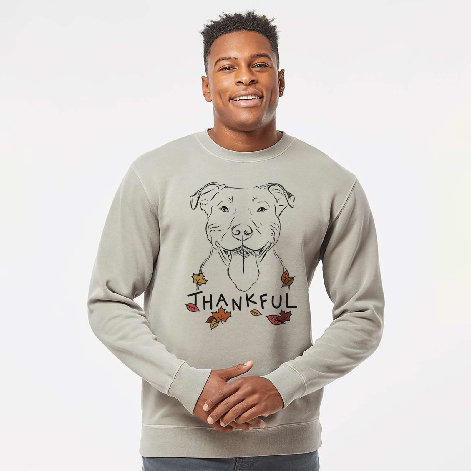 Hand-drawn sketch of Major the Pitbull with 'Thankful' lettering and autumn leaves on a Cement Unisex pigment dyed crew sweatshirt