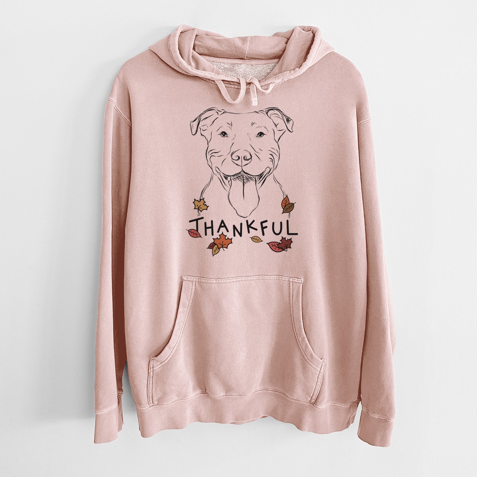 Hand-drawn sketch of Major the Pitbull with 'Thankful' lettering and autumn leaves on a Dusty Pink Unisex pigment dyed hoodie