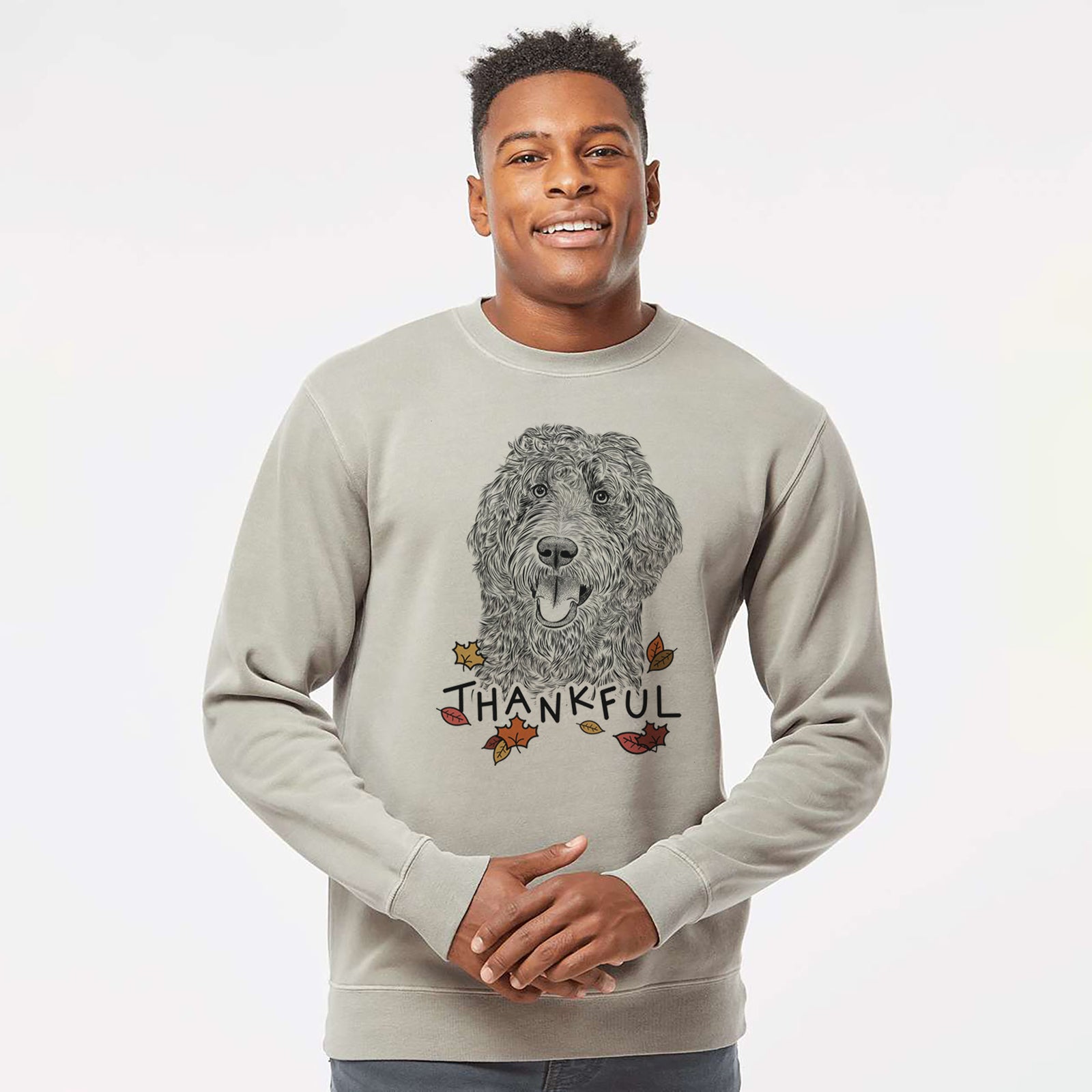 Hand-drawn sketch of Murr Dog the Labradoodle with 'Thankful' lettering and autumn leaves on a Cement Unisex pigment dyed crew sweatshirt