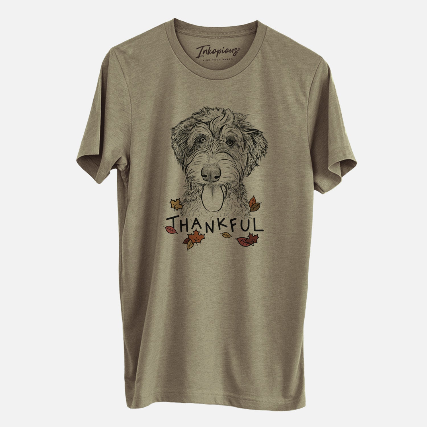 Hand-drawn sketch of Myrtle Mae the Aussiedoodle with 'Thankful' lettering and autumn leaves on an Olive Unisex crewneck