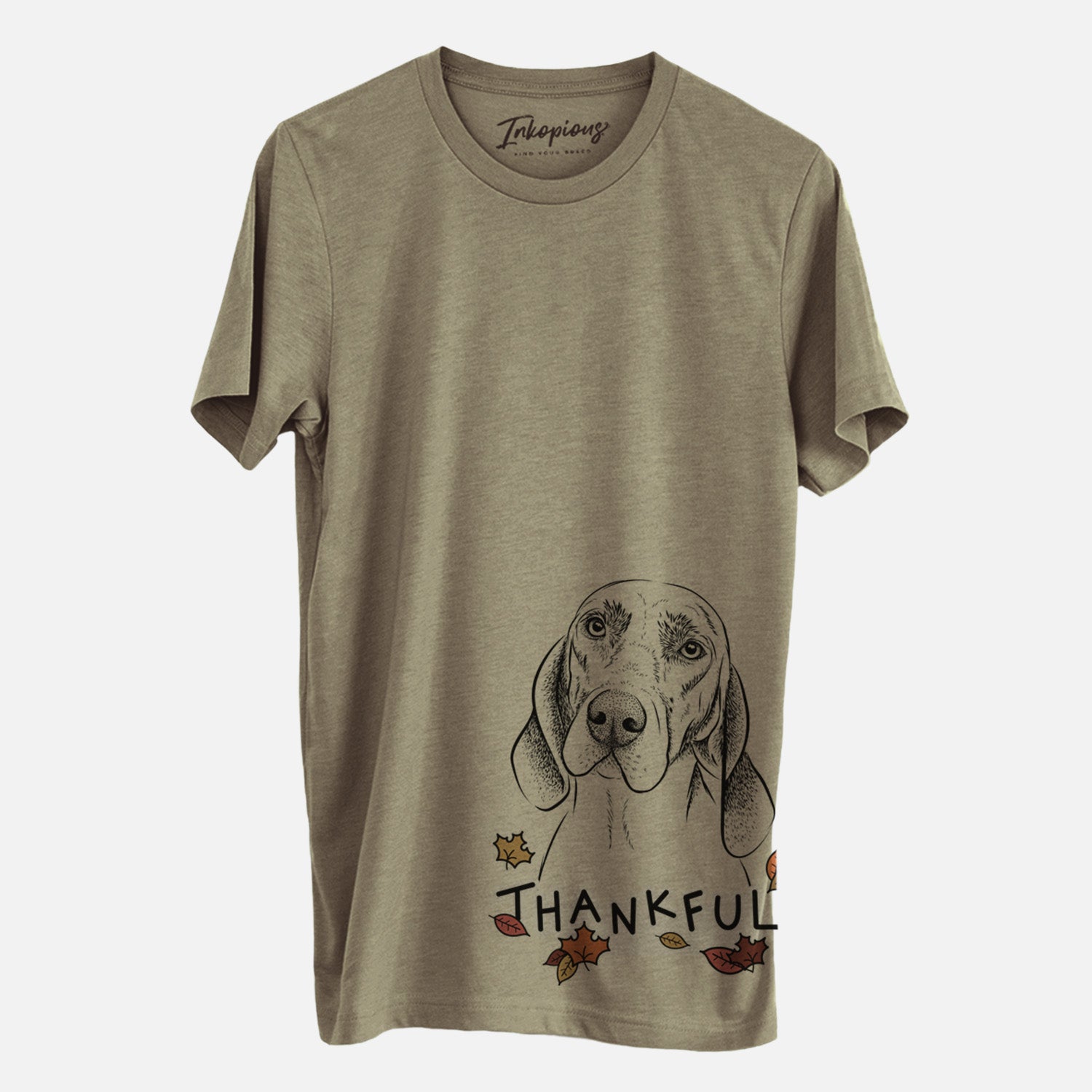 Hand-drawn sketch of Norman the Plott Hound with 'Thankful' lettering and autumn leaves on an Olive Unisex crewneck, worn by a man