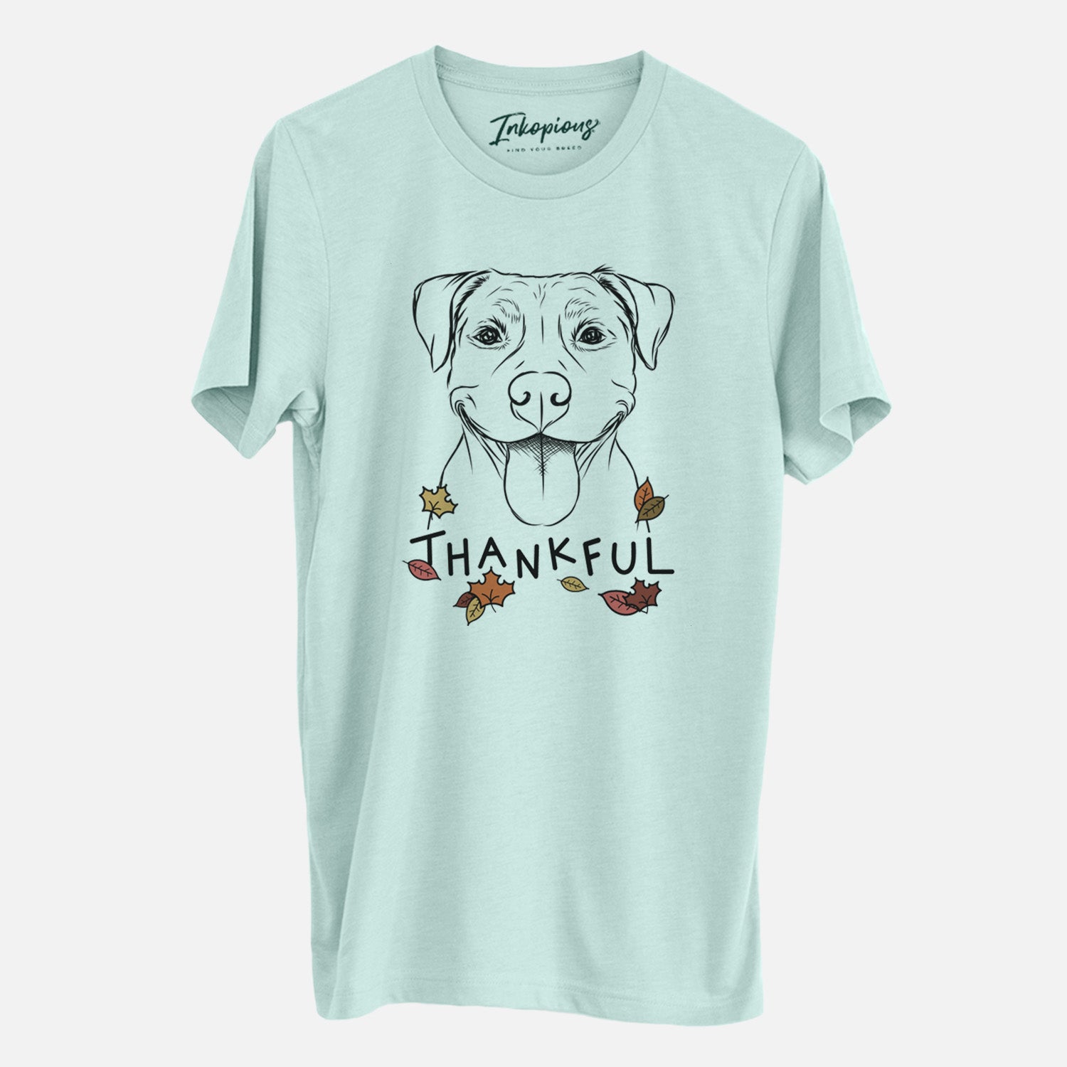 Hand-drawn sketch of Parker the Pitbull with 'Thankful' lettering and autumn leaves on a Heather Sage Unisex crewneck