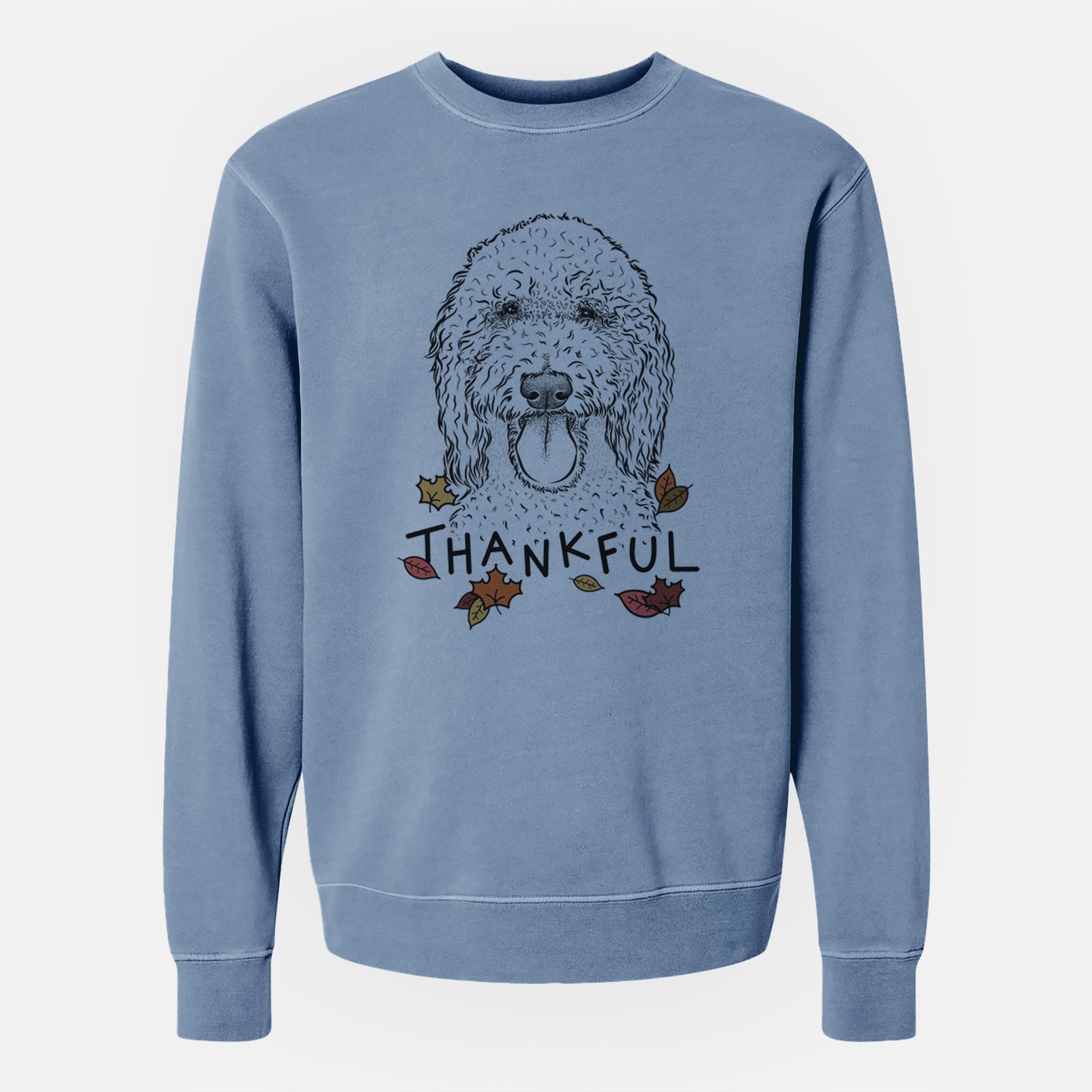 Hand-drawn sketch of Pavlov the Goldendoodle with 'Thankful' lettering and autumn leaves on a Slate Blue Unisex pigment dyed crew sweatshirt