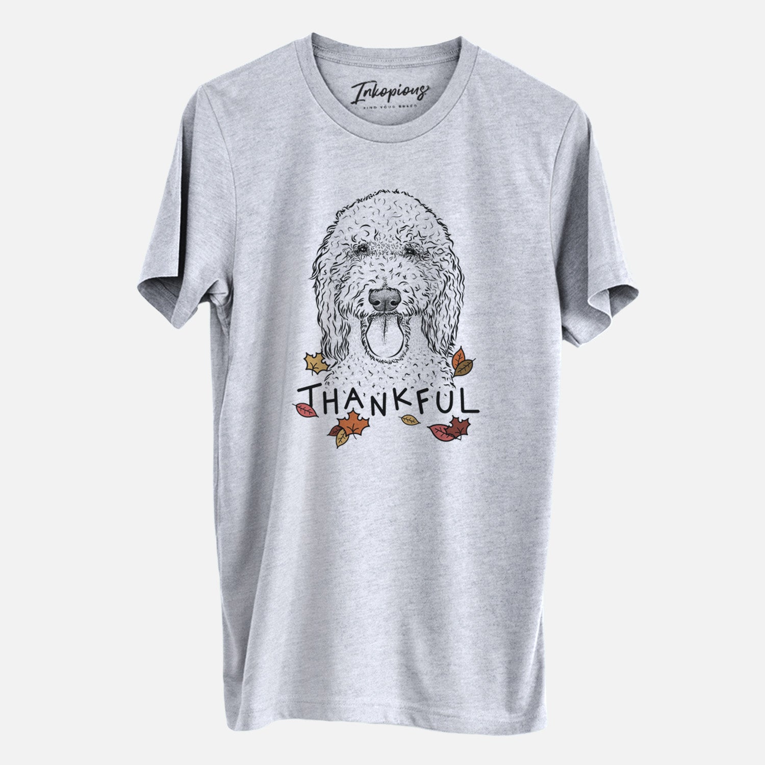 Hand-drawn sketch of Pavlov the Goldendoodle with 'Thankful' lettering and autumn leaves on a Grey Unisex crewneck