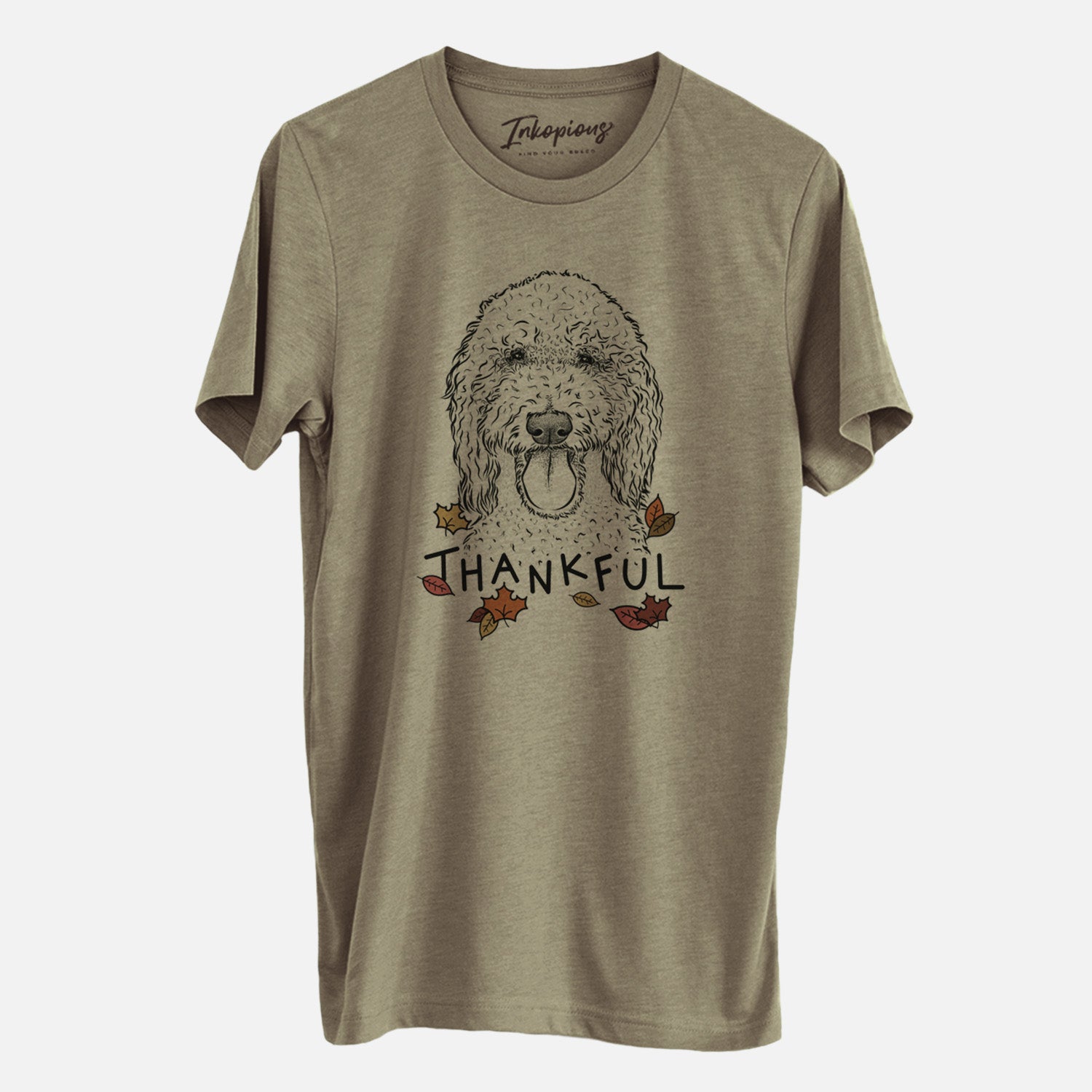 Hand-drawn sketch of Pavlov the Goldendoodle with 'Thankful' lettering and autumn leaves on an Olive Unisex crewneck
