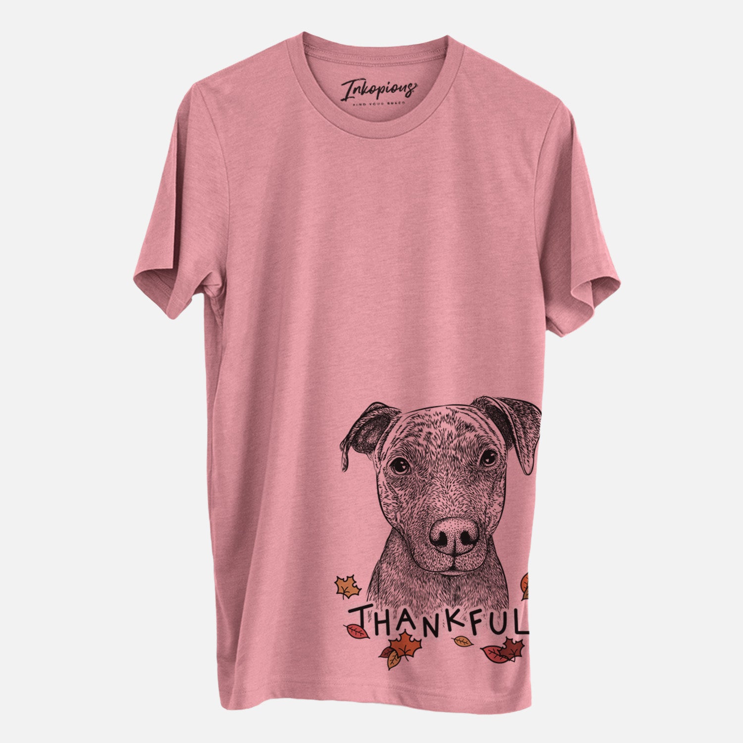 Hand-drawn sketch of Reeses the Pitbull with 'Thankful' lettering and autumn leaves on a Mauve Unisex crewneck, worn by a man