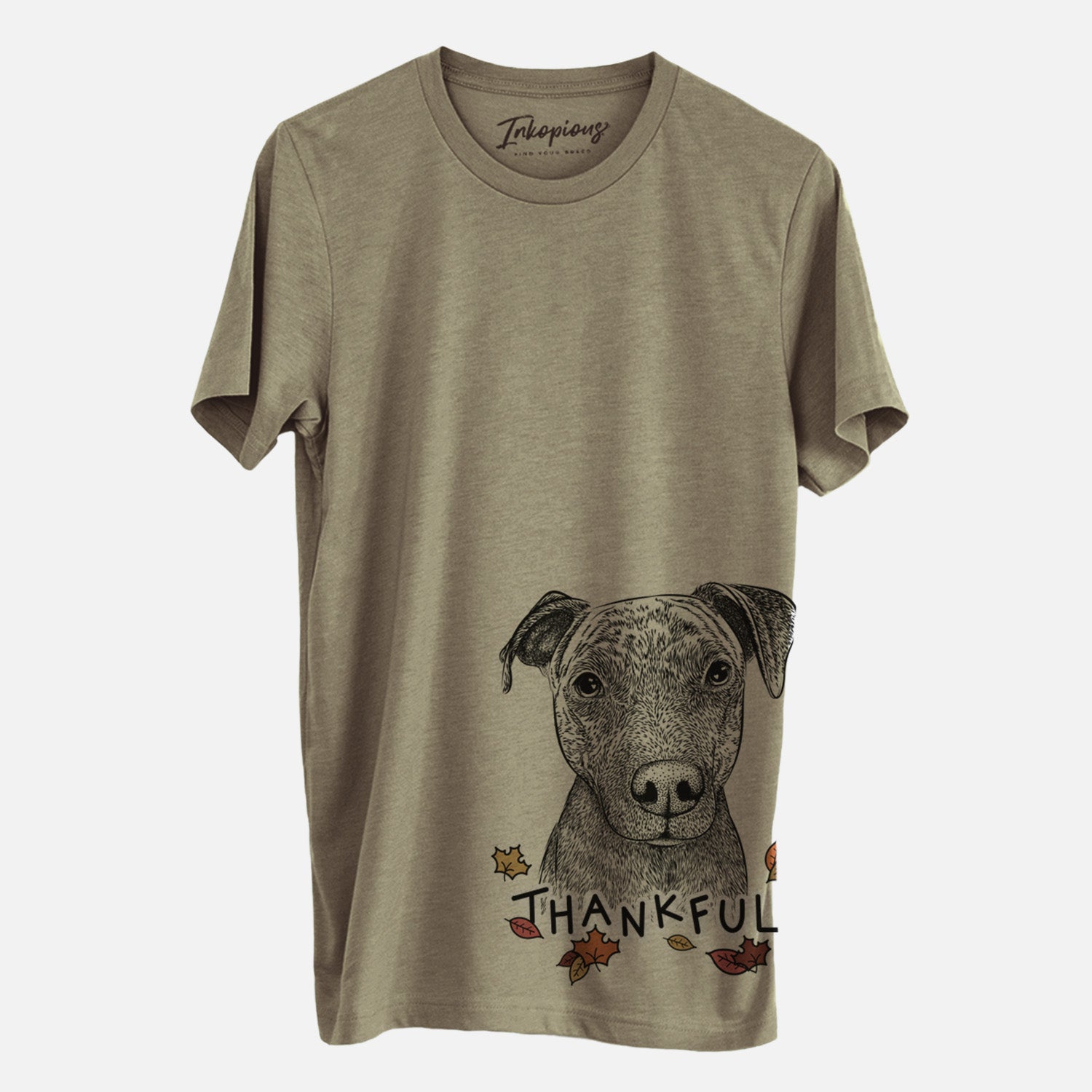 Hand-drawn sketch of Reeses the Pitbull with 'Thankful' lettering and autumn leaves on an Olive Unisex crewneck, worn by a man