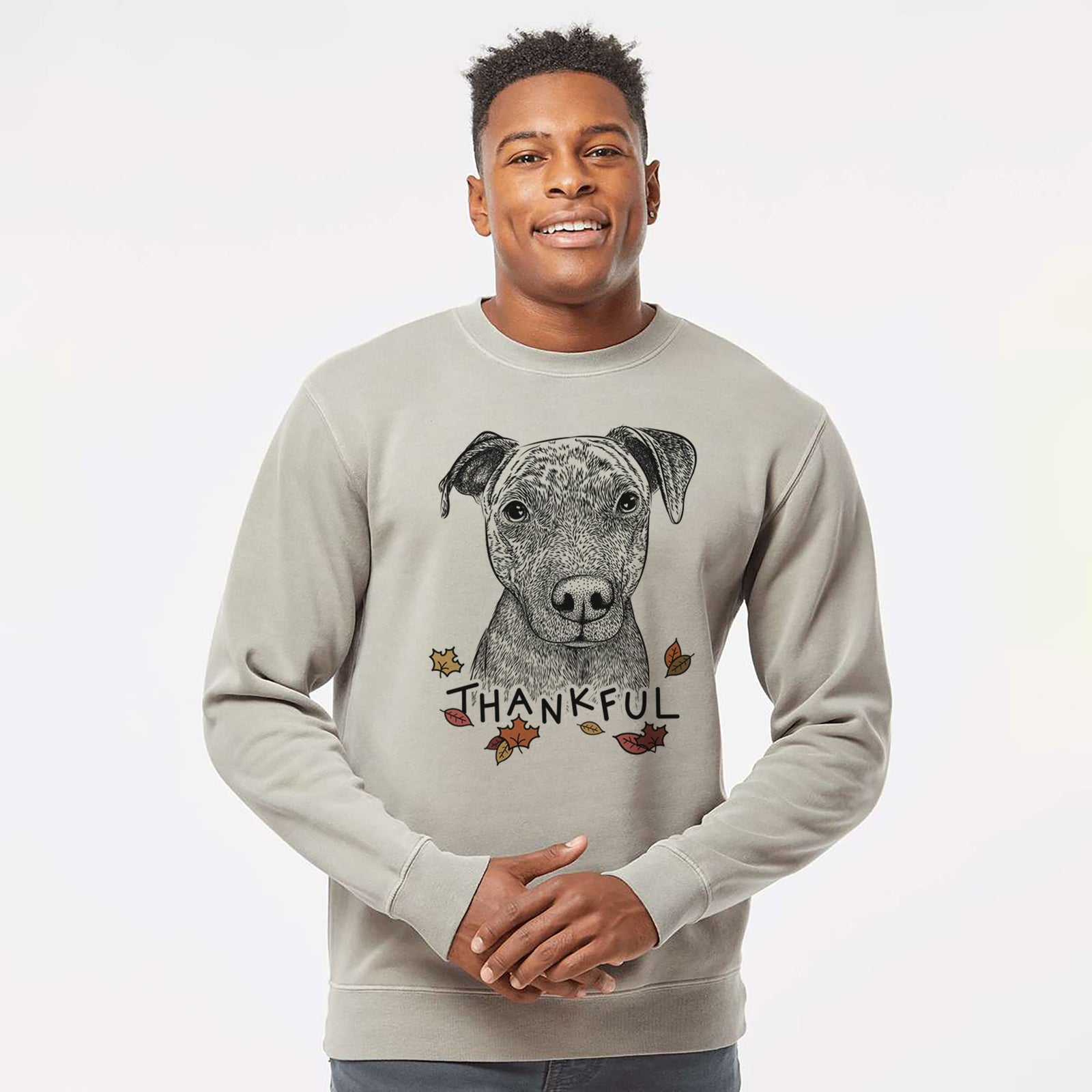 Hand-drawn sketch of Reeses the Pitbull with 'Thankful' lettering and autumn leaves on a Cement Unisex pigment dyed crew sweatshirt