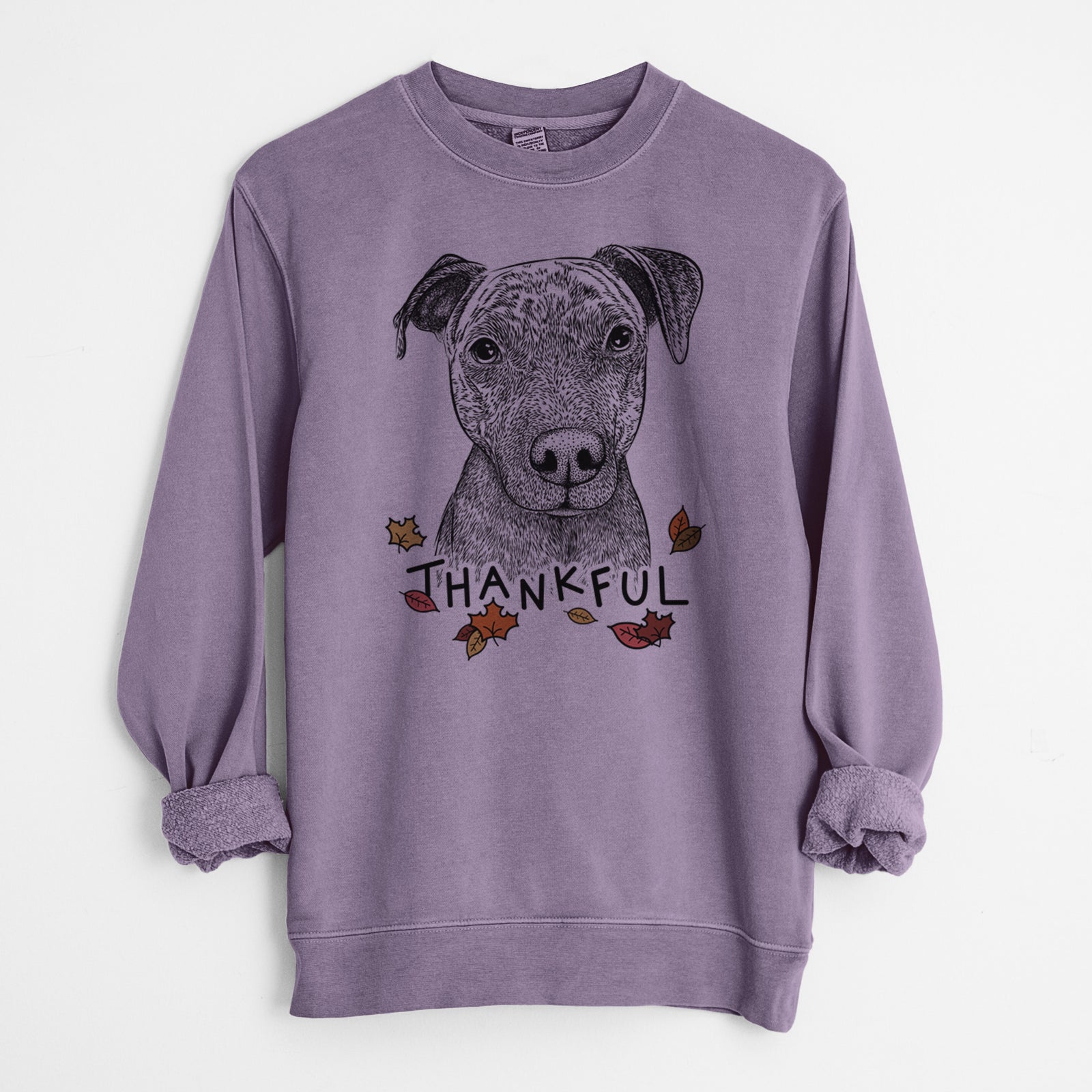 Hand-drawn sketch of Reeses the Pitbull with 'Thankful' lettering and autumn leaves on a Plum Unisex pigment dyed crew sweatshirt