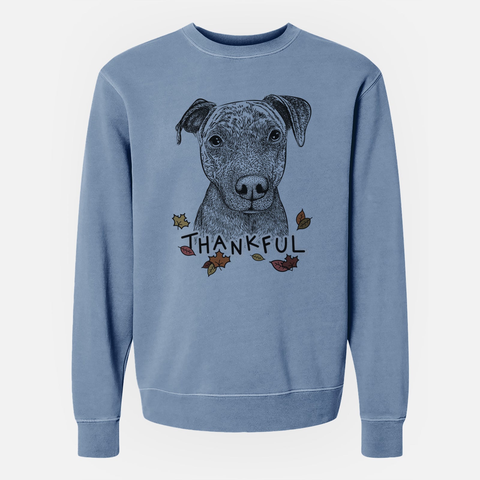 Hand-drawn sketch of Reeses the Pitbull with 'Thankful' lettering and autumn leaves on a Slate Blue Unisex pigment dyed crew sweatshirt
