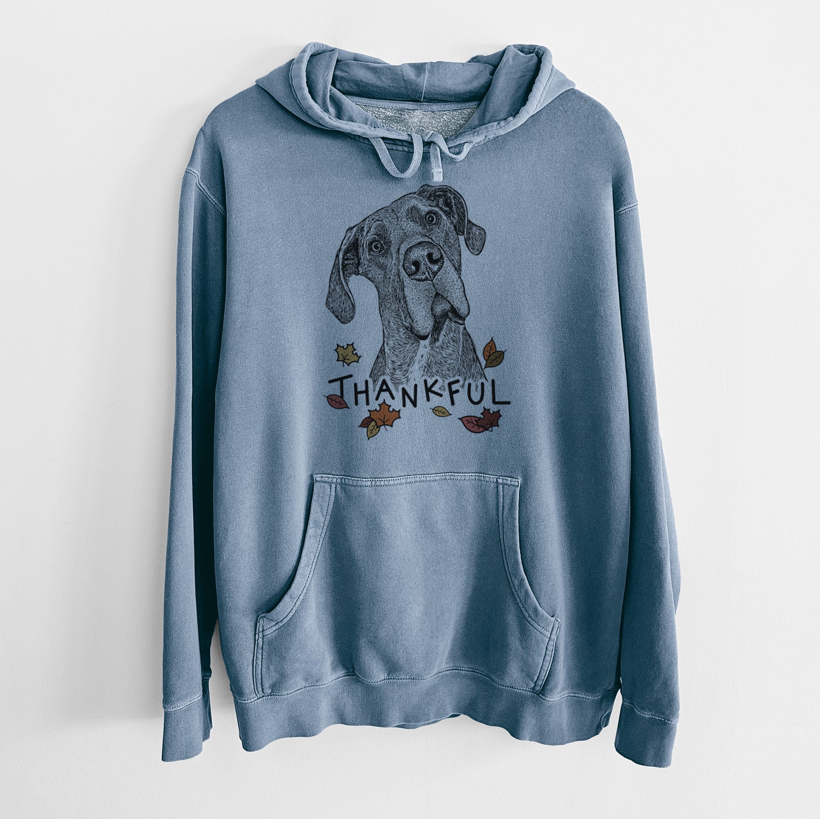 Hand-drawn sketch of River the Great Dane with 'Thankful' lettering and autumn leaves on a Slate Blue Unisex pigment dyed hoodie